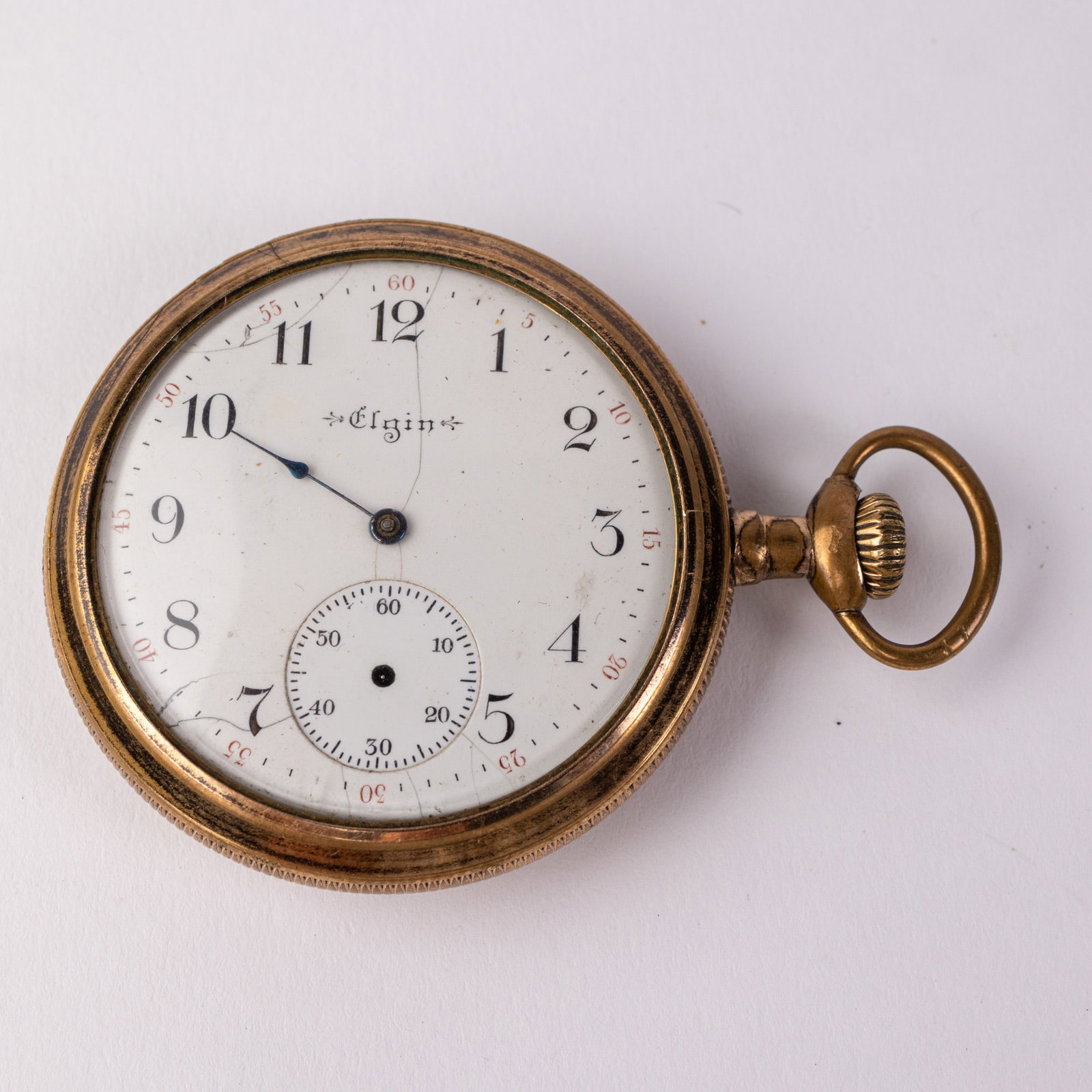 Antique Elgin Pocket Watch: Fifteen Jewels, gold filled, case marked 2030765, serial number 9662053, not running, needs work. Front dial has issues sealing and is missing minute and second hands Literature Brooks Auction –