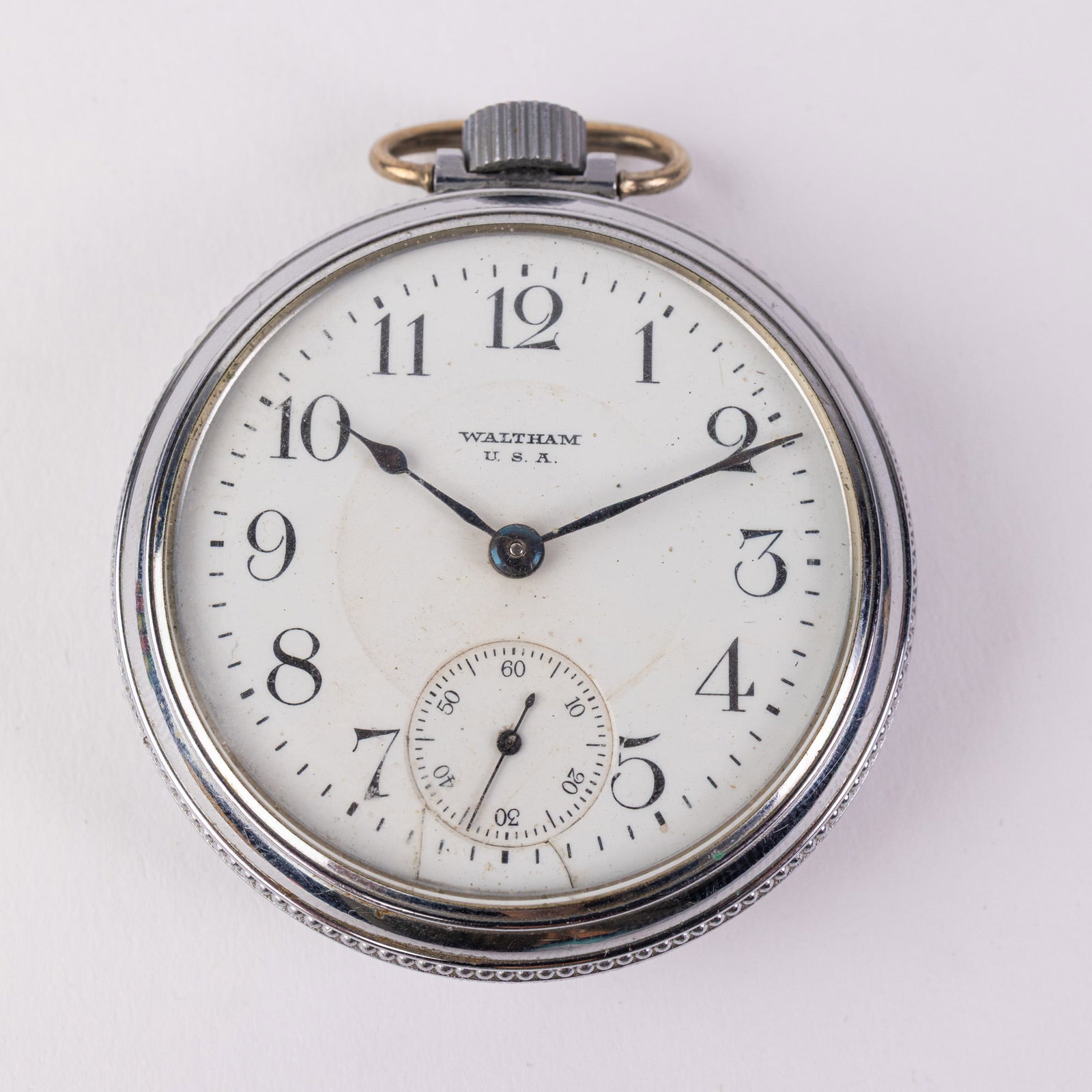 Vintage Waltham Train Motif Pocket Watch: 15 Jewels, case marked 0677120, serial number 21653793 Literature Brooks Auction – Online Auction Terms & Conditions Contact: (856) 694-2960 | info@brooks.auction READ BEFORE YOU BID: We want