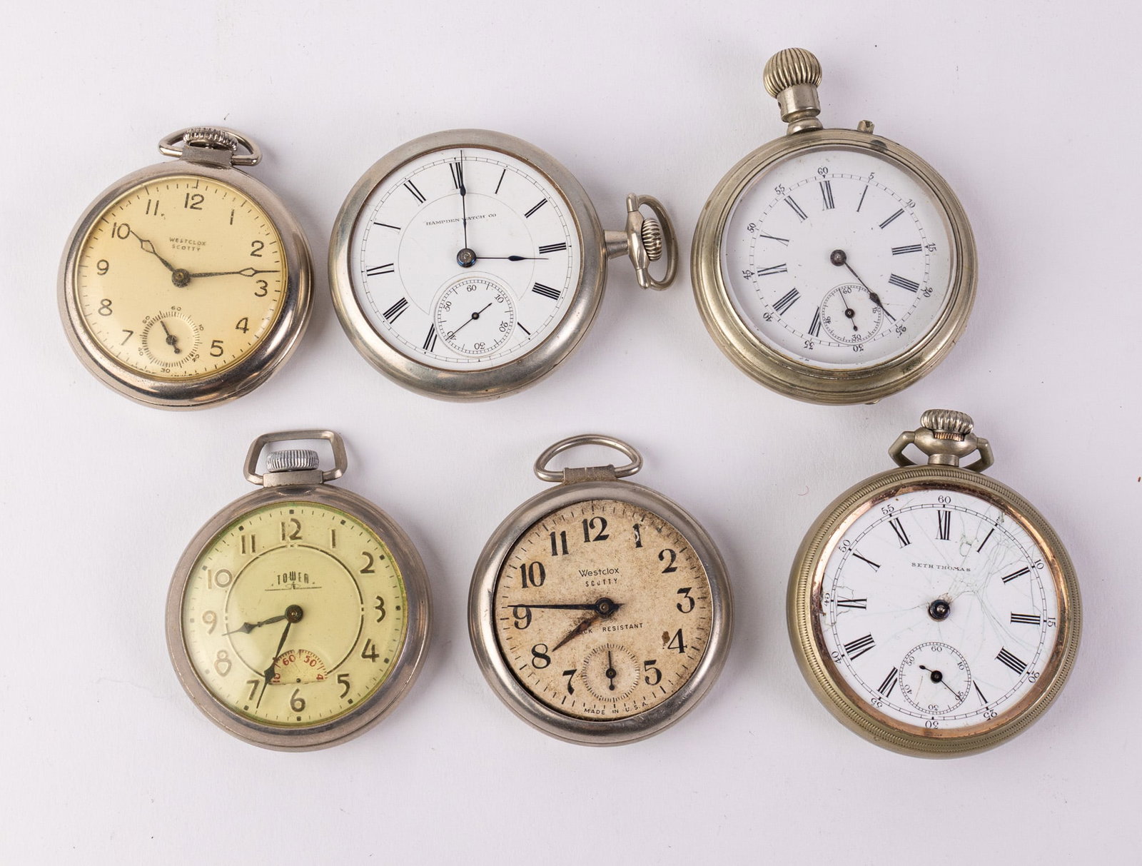 Grouping of Six Antique Pocket Watches ft. Seth Thomas & Hampden Watch Co: some are missing the crystal Literature Brooks Auction – Online Auction Terms & Conditions Contact: (856) 694-2960 | info@brooks.auction READ BEFORE YOU BID: We want you to feel confident when b
