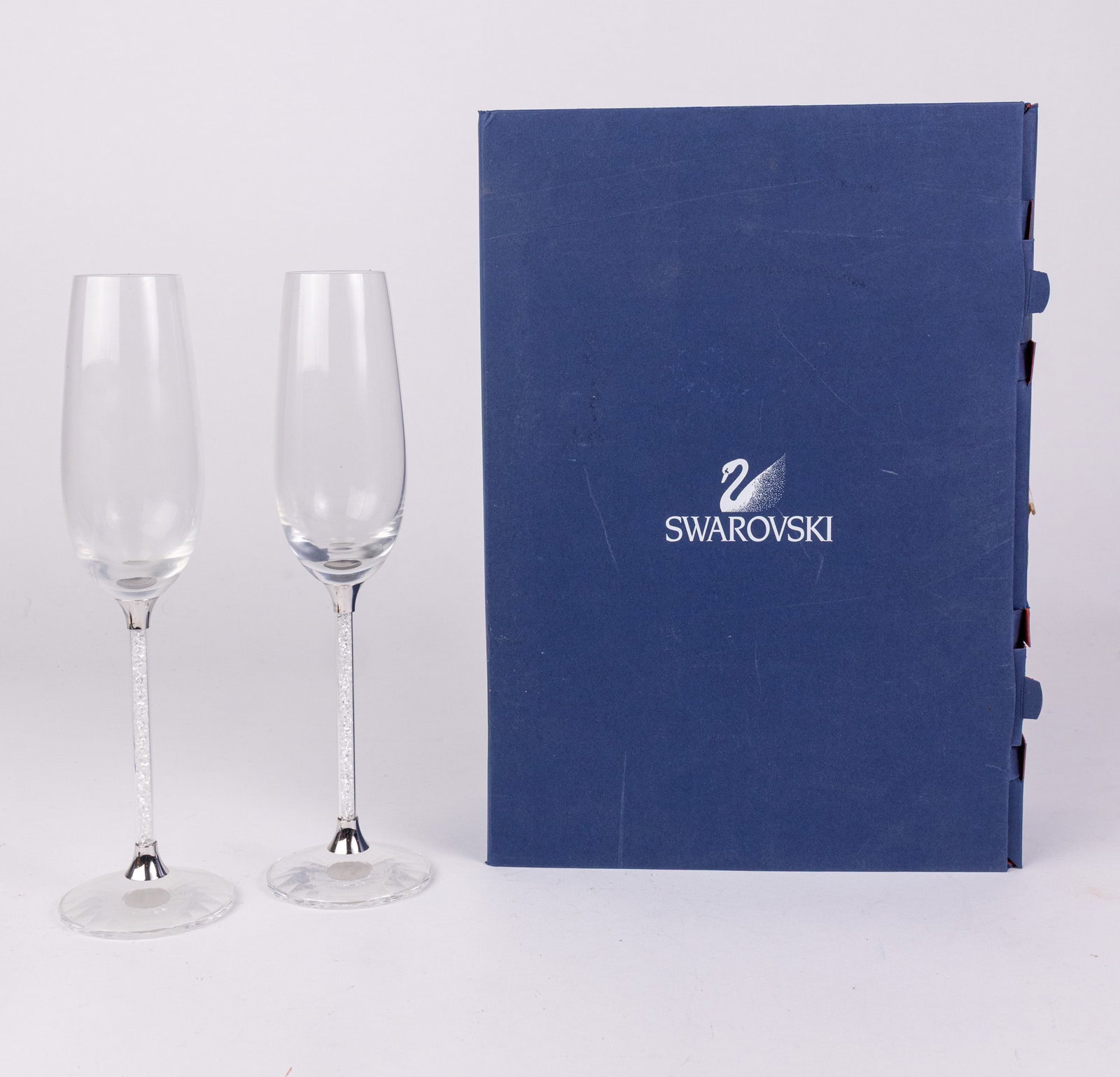Pair of Swarovski Selection Crystalline Toasting Flutes IOB: Pair of Swarovski Selection Crystalline Toasting Flutes IOB by designer Steven Weinberg Size 10.5" H Literature Brooks Auction – Online Auction Terms & Conditions Contact: (856) 694-2960 |