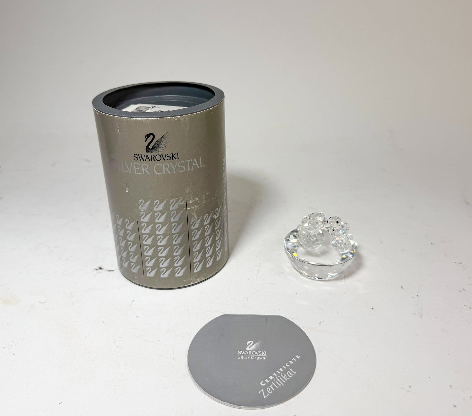 Swarovski Silver Crystal Bird's Nest IOB: Swarovski Silver Crystal Bird's Nest IOB Size 2" H Literature Brooks Auction – Online Auction Terms & Conditions Contact: (856) 694-2960 | info@brooks.auction READ BEFORE YOU BID: We wan