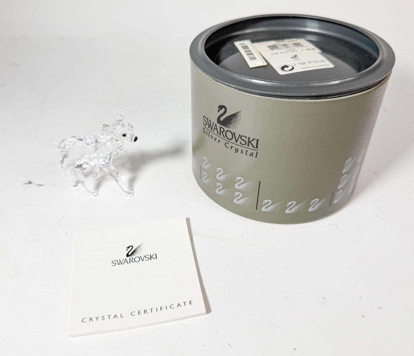 Swarovski Silver Crystal Standing Fawn IOB: Swarovski Silver Crystal Standing Fawn IOB Size 2.5" H Literature Brooks Auction – Online Auction Terms & Conditions Contact: (856) 694-2960 | info@brooks.auction READ BEFORE YOU BID: We