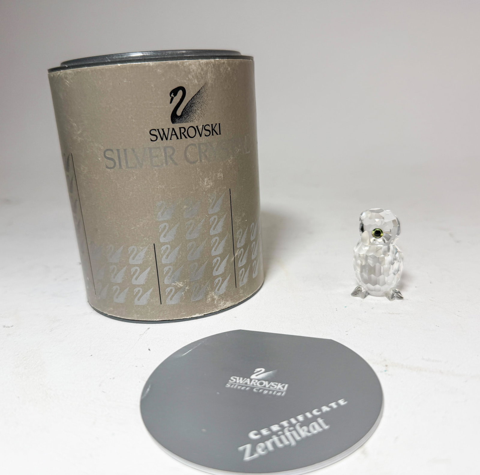 Swarovski " Crystal Owlet" Figurine IOB: Swarovski " Crystal Owlet" Figurine IOB Size 1.75"H Literature Brooks Auction – Online Auction Terms & Conditions Contact: (856) 694-2960 | info@brooks.auction READ BEFORE YOU BID: We want you