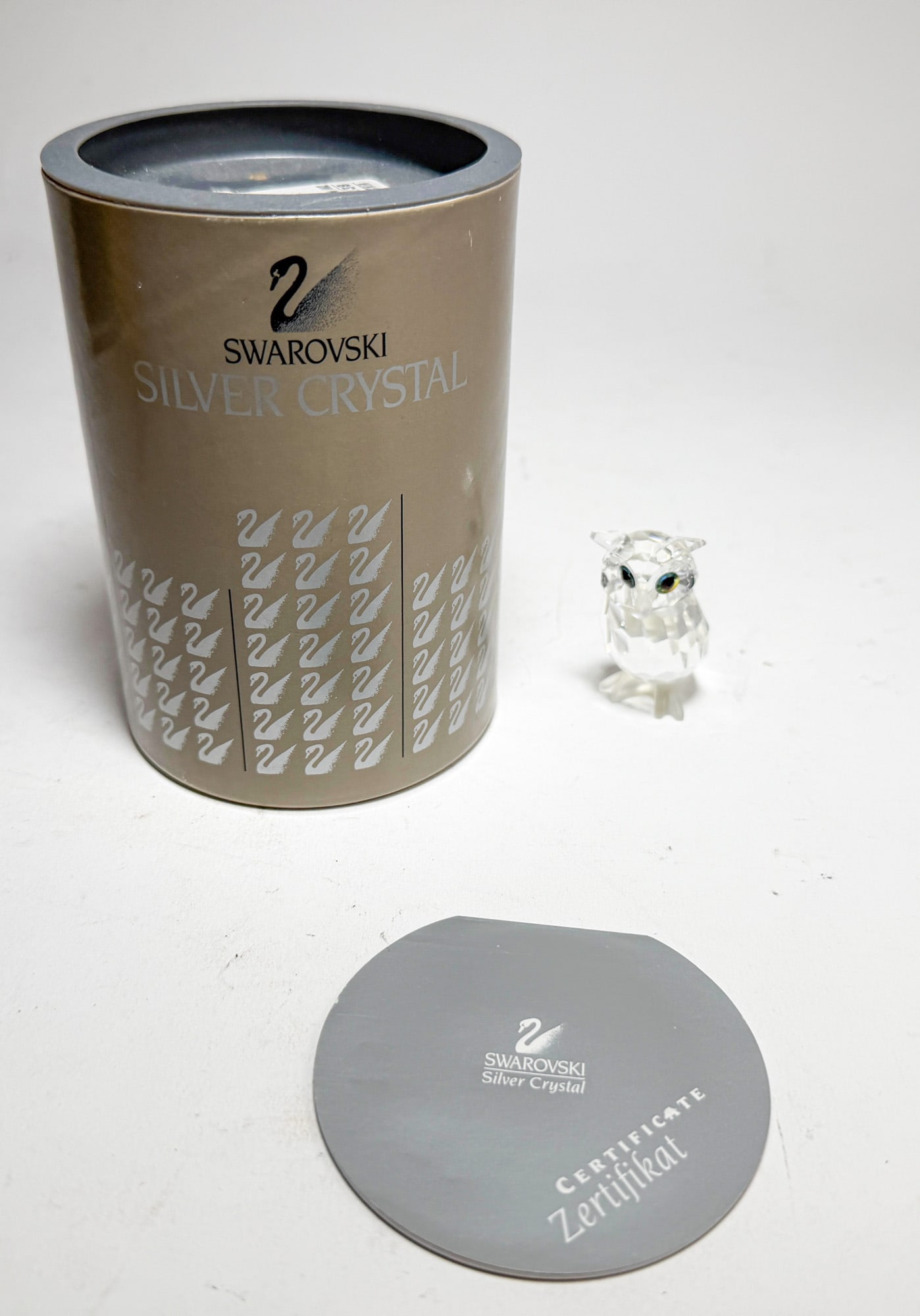 Swarovski Silver Crystal "Night Owl" IOB: Swarovski Silver Crystal "Night Owl" IOB Size 2" H Literature Brooks Auction – Online Auction Terms & Conditions Contact: (856) 694-2960 | info@brooks.auction READ BEFORE YOU BID: We wan