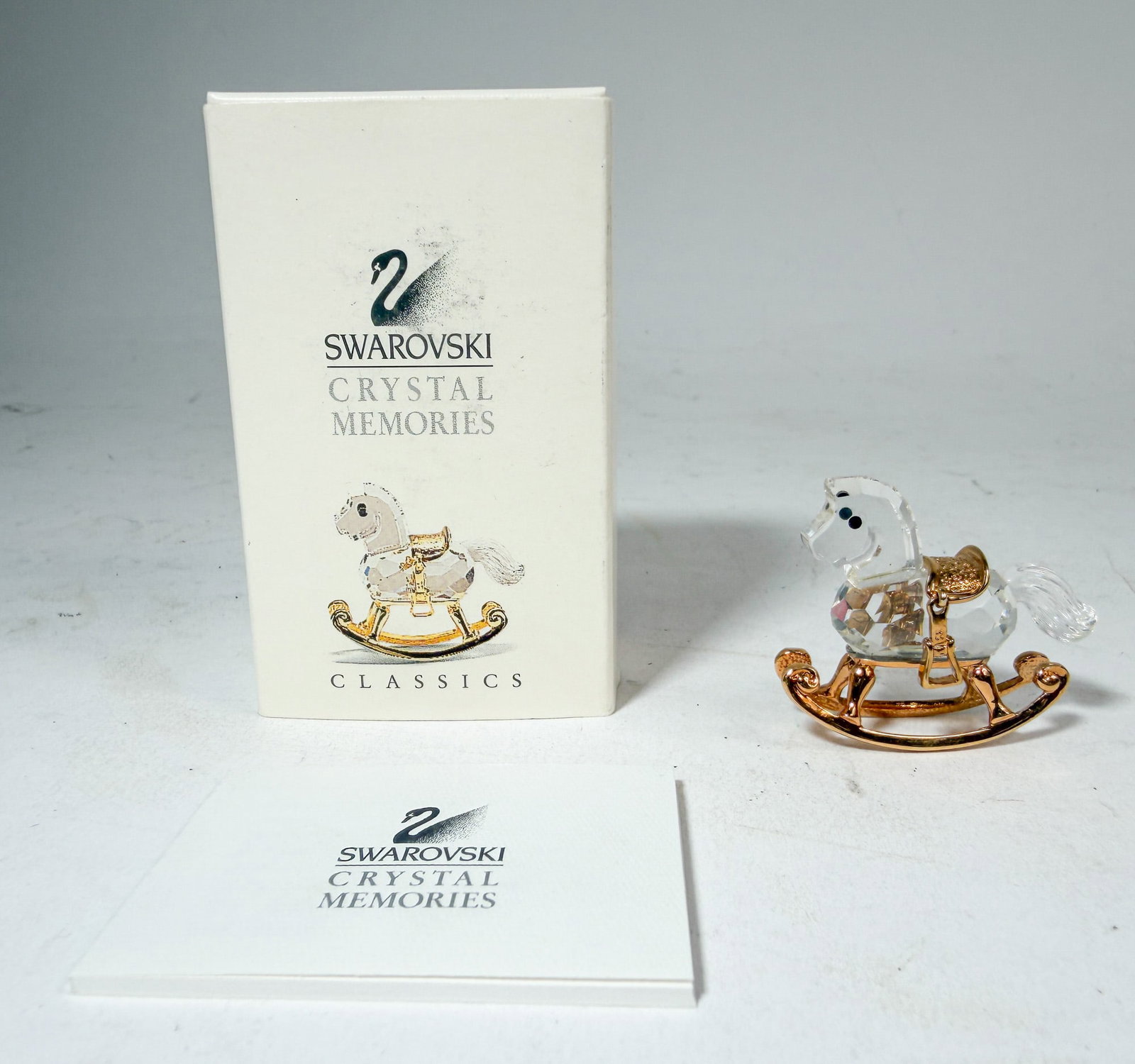 Swarovski Crystal Memories Rocking Horse IOB: Swarovski Crystal Memories Rocking Horse IOB Size 1.5" H Literature Brooks Auction – Online Auction Terms & Conditions Contact: (856) 694-2960 | info@brooks.auction READ BEFORE YOU BID: