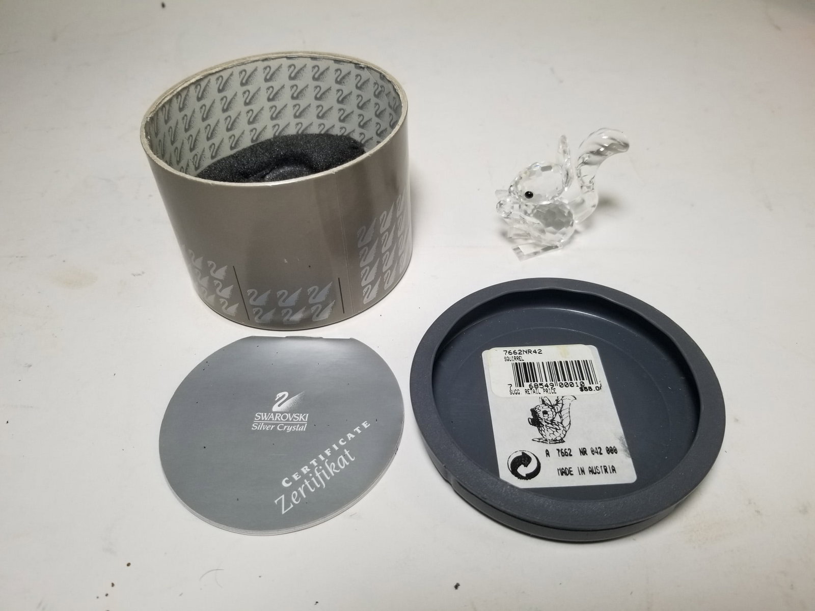 Swarovski Silver Crystal Squirrel IOB: Swarovski Silver Crystal Squirrel IOB Size 2" H Literature Brooks Auction – Online Auction Terms & Conditions Contact: (856) 694-2960 | info@brooks.auction READ BEFORE YOU BID: We want you to