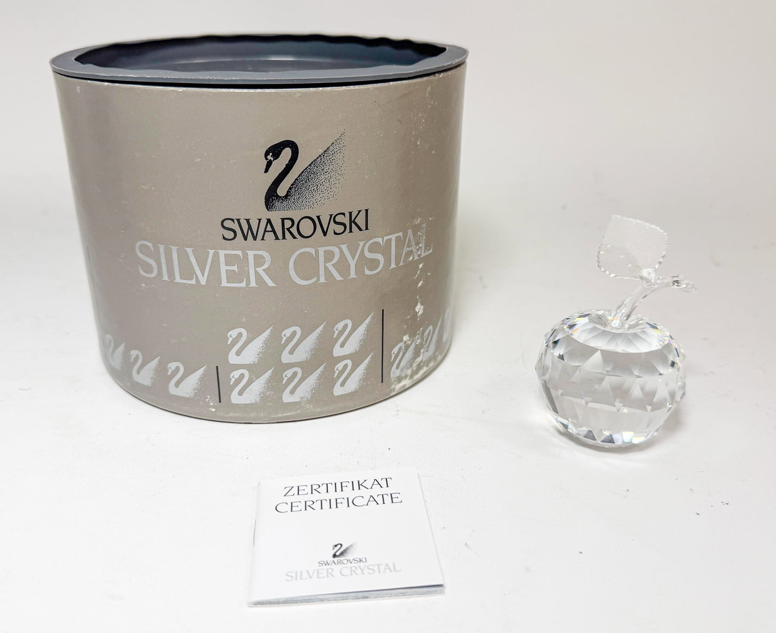 Swarovski Silver Crystal Apple IOB: Swarovski Silver Crystal Apple IOB Size 3.5" H Literature Brooks Auction – Online Auction Terms & Conditions Contact: (856) 694-2960 | info@brooks.auction READ BEFORE YOU BID: We want you to