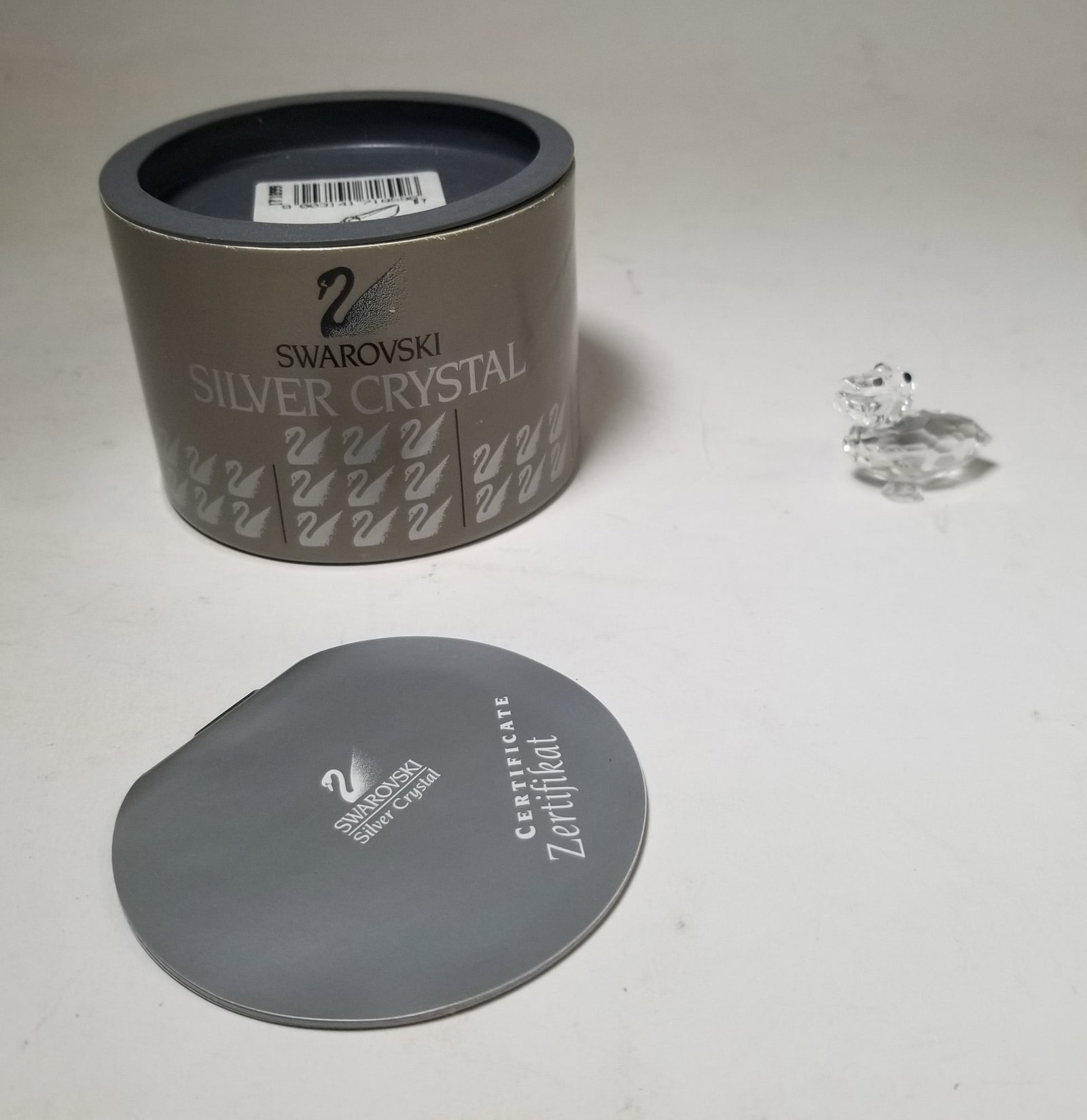 Swarovski Silver Crystal Pelican IOB: Swarovski Silver Crystal Pelican IOB Size 1.25" H Literature Brooks Auction – Online Auction Terms & Conditions Contact: (856) 694-2960 | info@brooks.auction READ BEFORE YOU BID: We want you to