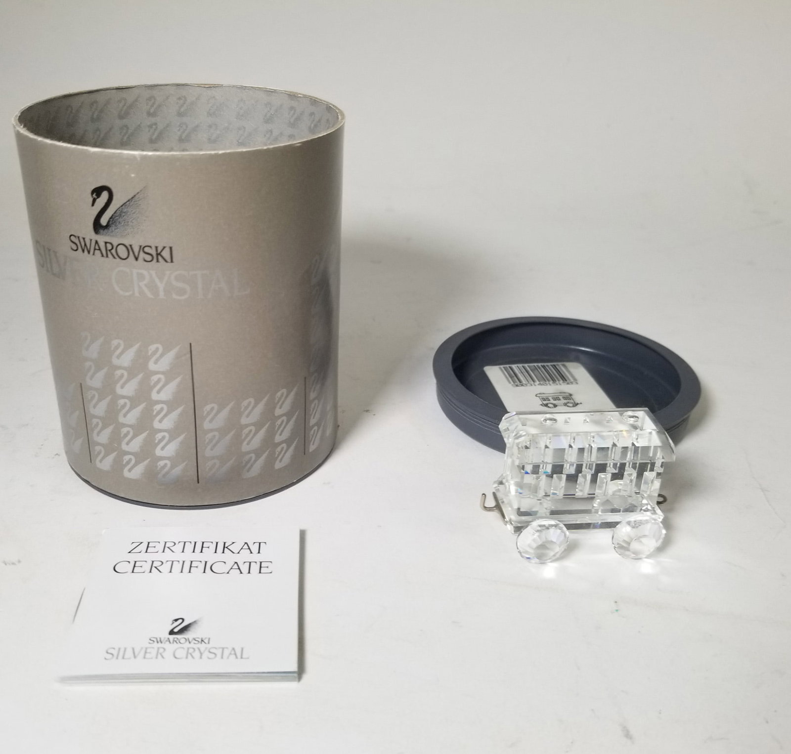 Swarovski Silver Crystal Train Car IOB: Swarovski Silver Crystal Train Car IOB Size 1.25" H Literature Brooks Auction – Online Auction Terms & Conditions Contact: (856) 694-2960 | info@brooks.auction READ BEFORE YOU BID: We want you