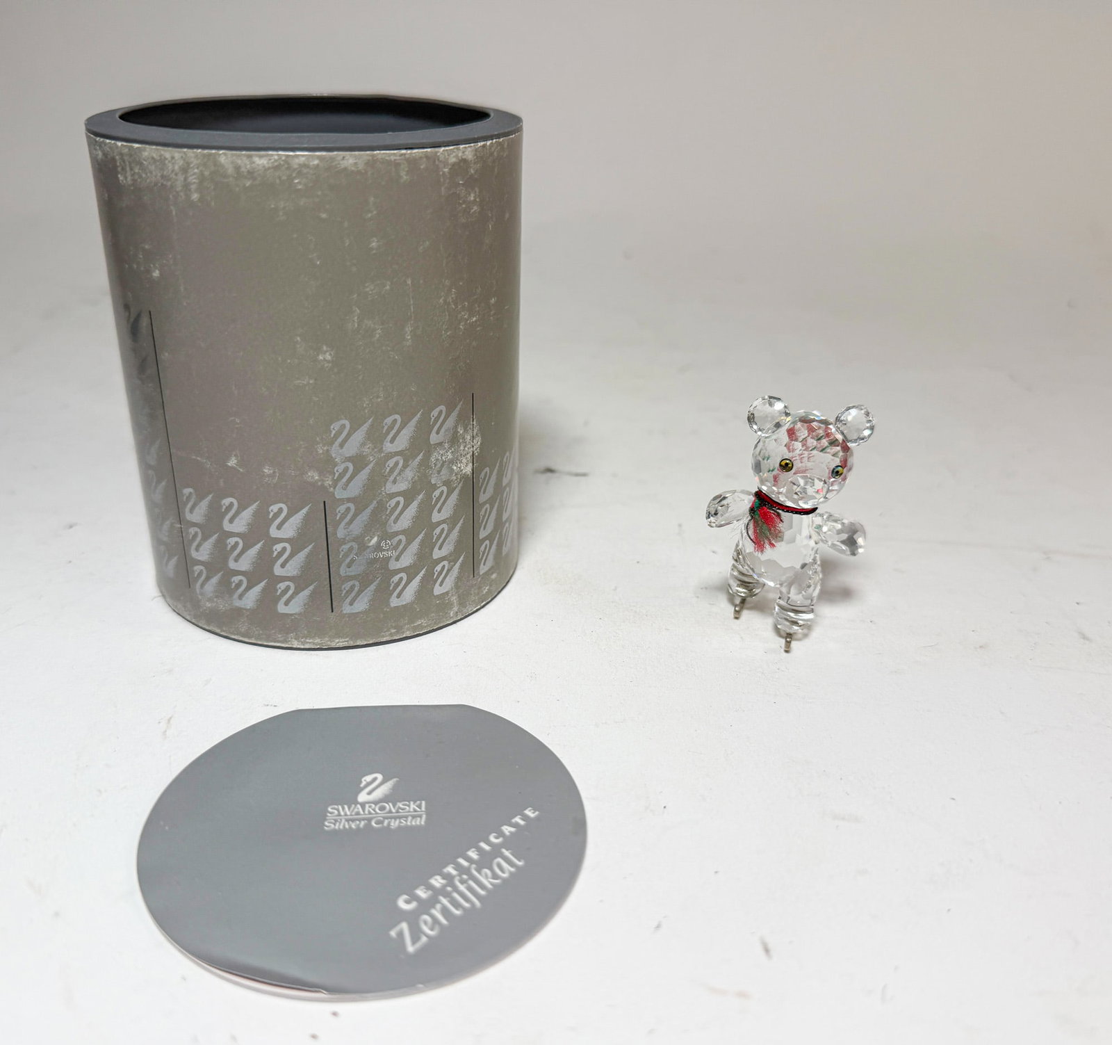 Swarovski Silver Crystal "Kris Bear on Skates" IOB: Swarovski Silver Crystal "Kris Bear on Skates" IOB Size 2" H Literature Brooks Auction – Online Auction Terms & Conditions Contact: (856) 694-2960 | info@brooks.auction READ BEFORE YOU BID:<
