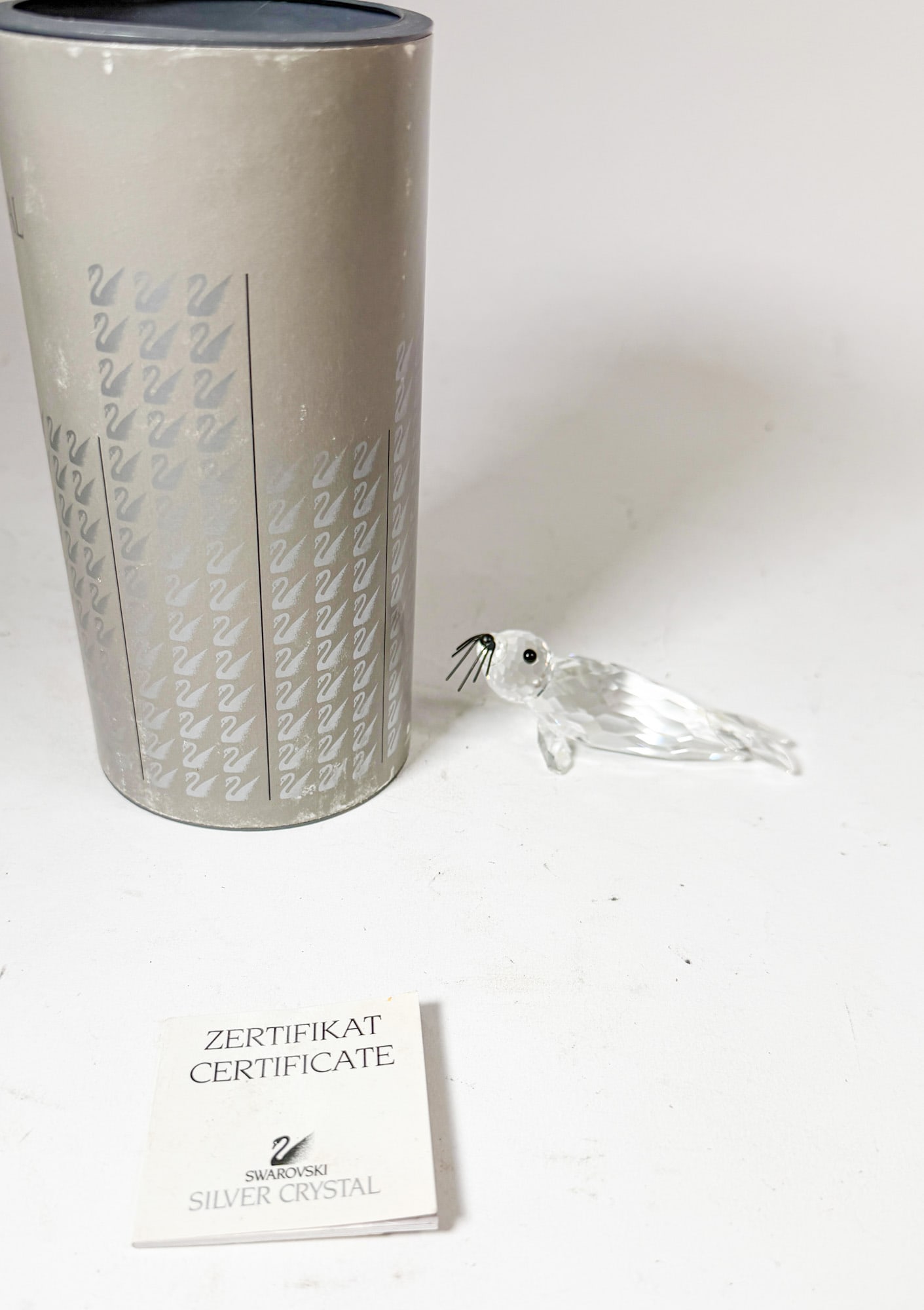 Swarovski Silver Crystal Seal IOB: Swarovski Silver Crystal Seal IOB Size 1.5" H Literature Brooks Auction – Online Auction Terms & Conditions Contact: (856) 694-2960 | info@brooks.auction READ BEFORE YOU BID: We want you to