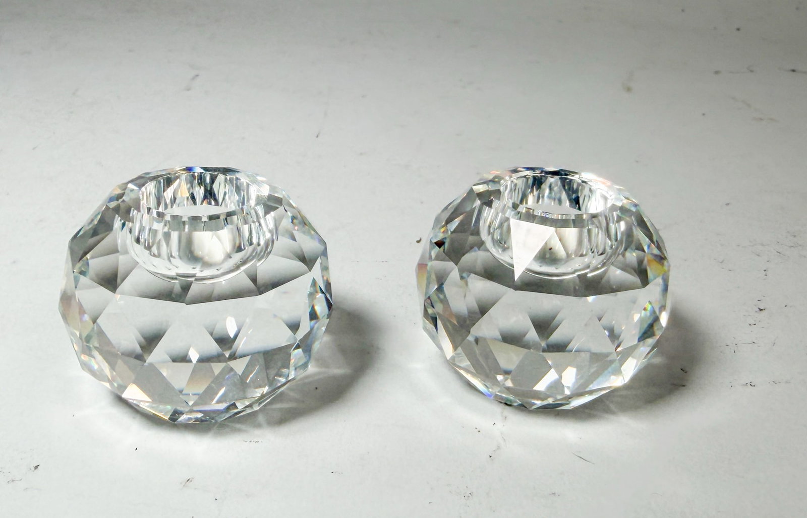 Pair of Swarovski Crystal Candle Holders: Pair of Swarovski Crystal Candle Holders Size 1.5" H Literature Brooks Auction – Online Auction Terms & Conditions Contact: (856) 694-2960 | info@brooks.auction READ BEFORE YOU BID: We w