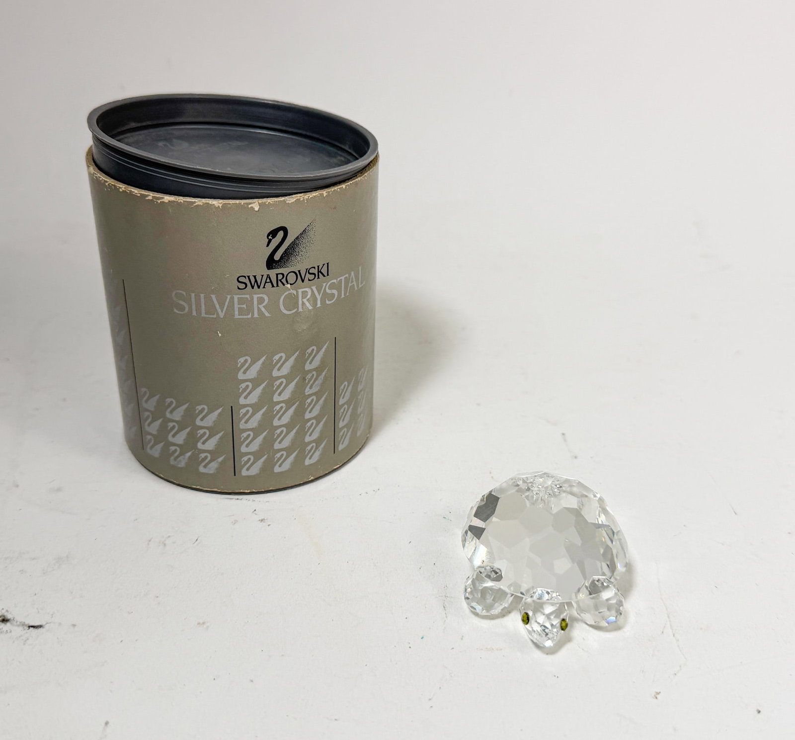 Swarovski Silver Crystal Turtle IOB: Swarovski Silver Crystal Turtle IOB Size 2.25" H Literature Brooks Auction – Online Auction Terms & Conditions Contact: (856) 694-2960 | info@brooks.auction READ BEFORE YOU BID: We want