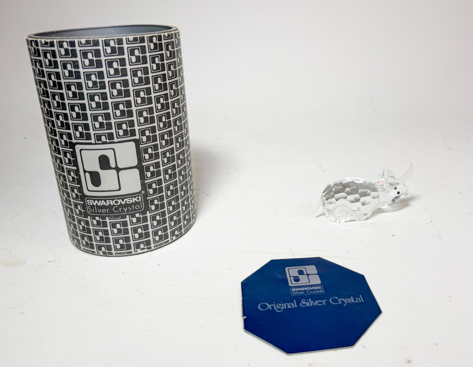 Swarovski Silver Crystal Rhinoceros IOB: Swarovski Silver Crystal Rhinoceros IOB Size 1.5" H Literature Brooks Auction – Online Auction Terms & Conditions Contact: (856) 694-2960 | info@brooks.auction READ BEFORE YOU BID: We wa