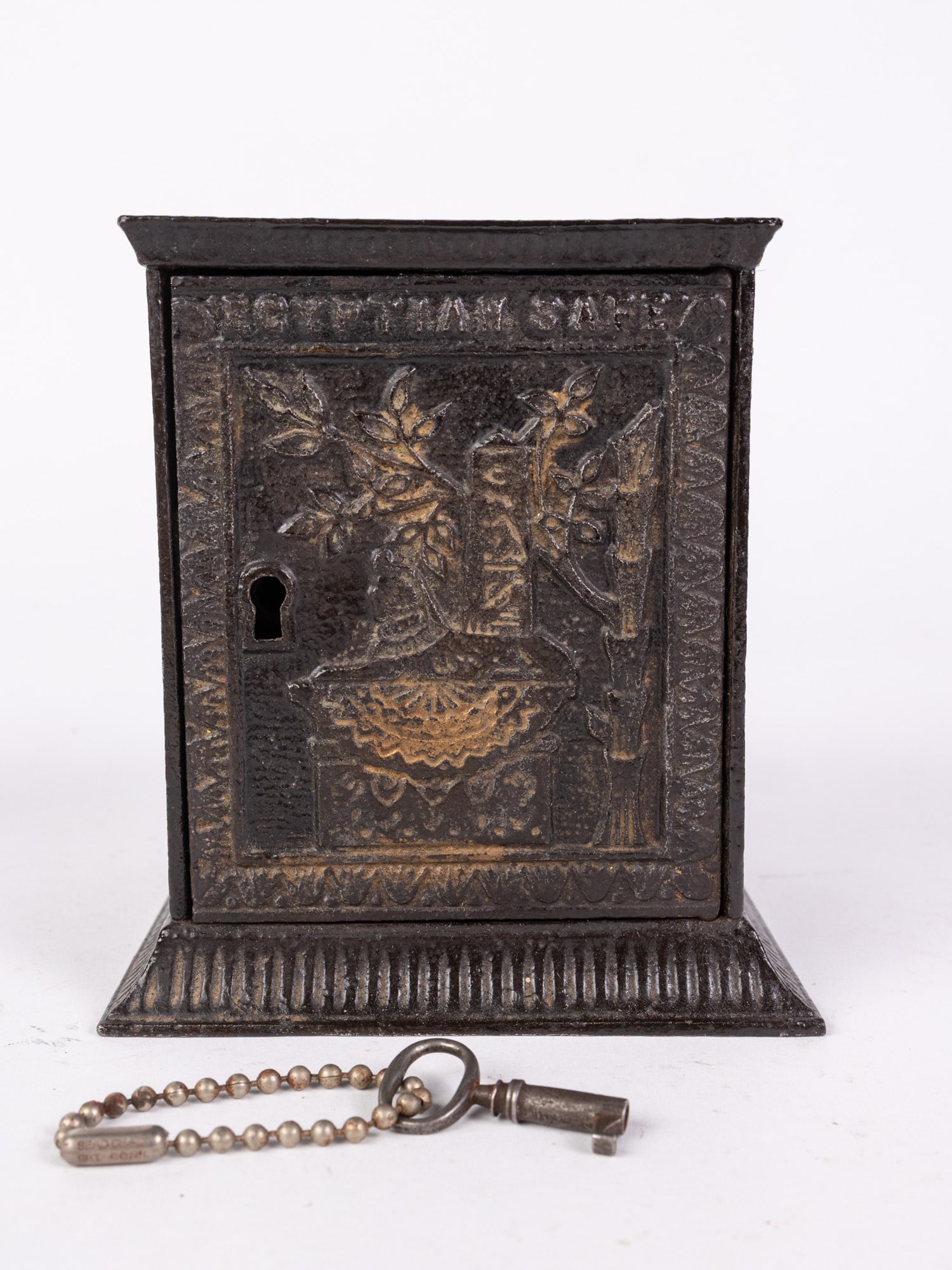 Antique "Egyptian Safe" Cast Iron Bank: Antique "Egyptian Safe" Cast Iron Bank Size 5" x 4" x 4" Literature Brooks Auction – Online Auction Terms & Conditions Contact: (856) 694-2960 | info@brooks.auction READ BEFORE YOU BID: