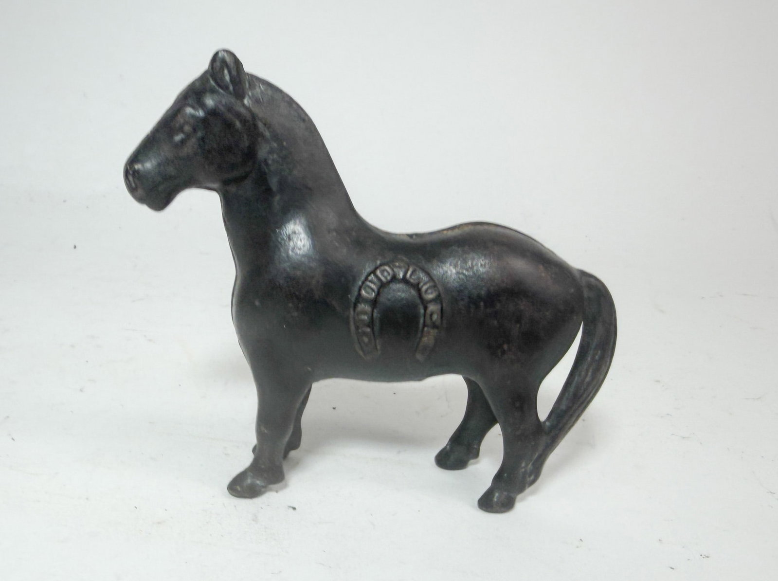 "Good Luck" Cast Iron Horse Bank: "Good Luck" Cast Iron Horse Bank Size 4" H Literature Brooks Auction – Online Auction Terms & Conditions Contact: (856) 694-2960 | info@brooks.auction READ BEFORE YOU BID: We want you to feel