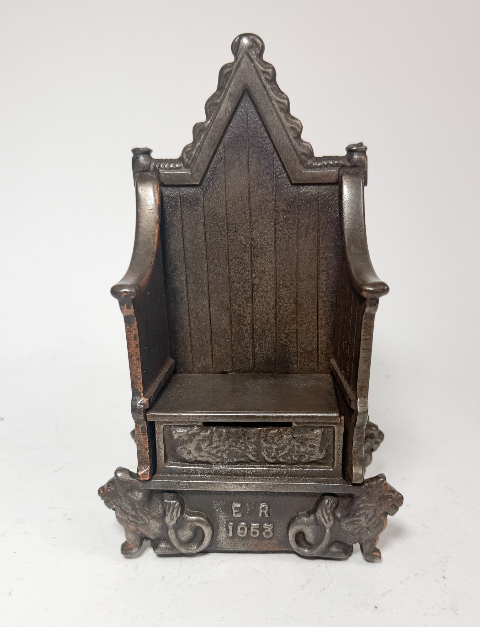Cast Iron Commemorative 1953 Queen's Coronation Chair Bank: Cast Iron Commemorative 1953 Queen's Coronation Chair Bank Size 8" H Literature Brooks Auction – Online Auction Terms & Conditions Contact: (856) 694-2960 | info@brooks.auction READ BEFORE YOU