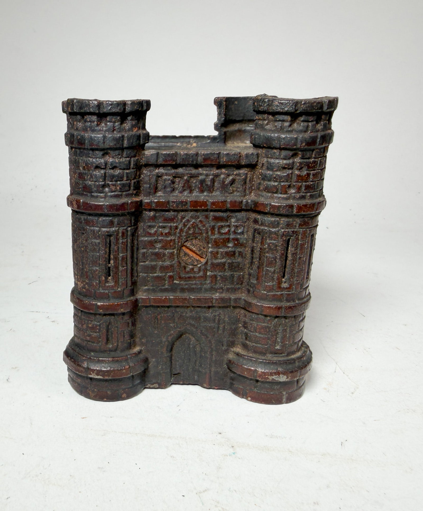 Cast Iron Castle Still Bank: Cast Iron Castle Still Bank, some damage Size 4" H Literature Brooks Auction – Online Auction Terms & Conditions Contact: (856) 694-2960 | info@brooks.auction READ BEFORE YOU BID: We wan
