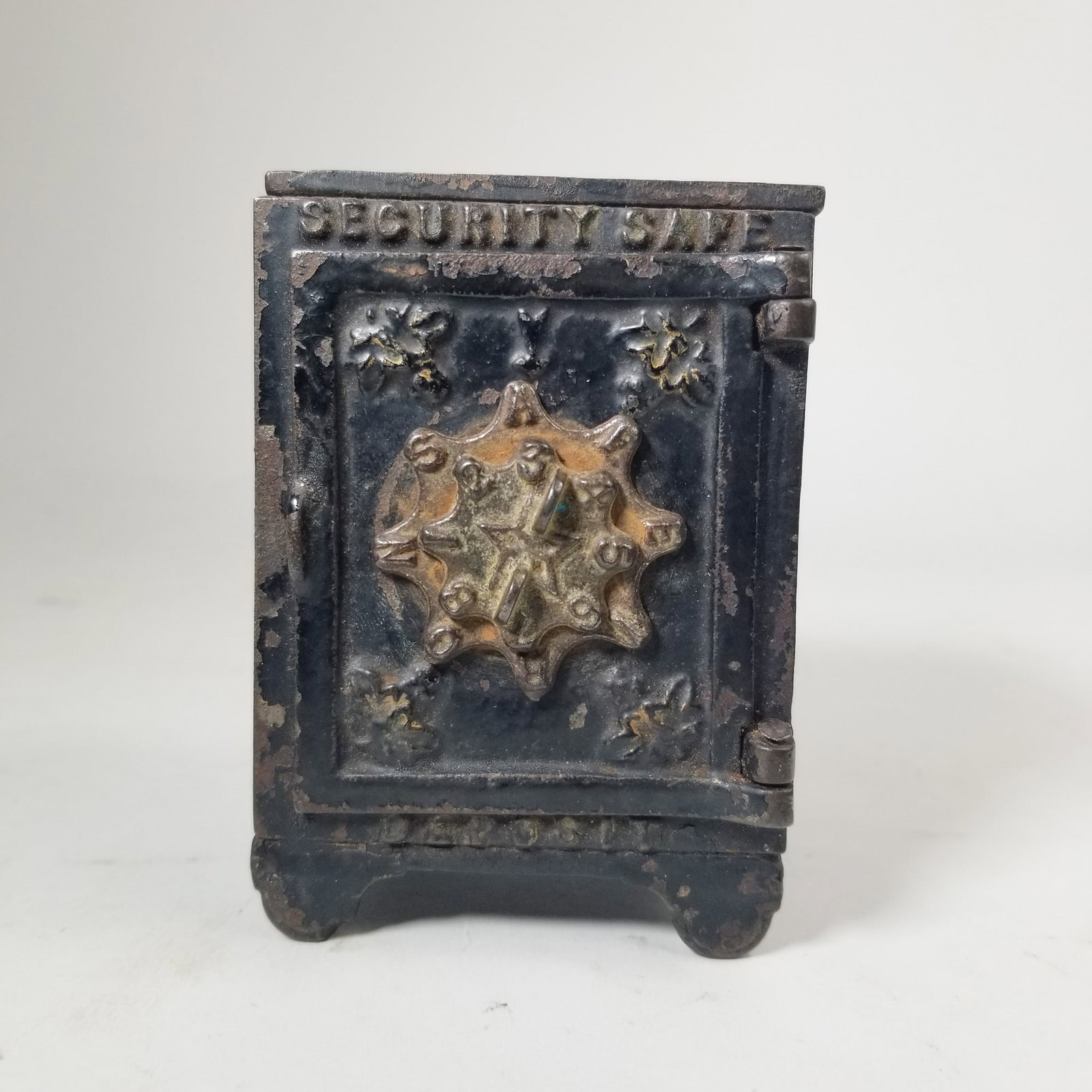 Cast Iron Security Safe Deposit Bank: Cast Iron Security Safe Deposit Bank Size 4" H Literature Brooks Auction – Online Auction Terms & Conditions Contact: (856) 694-2960 | info@brooks.auction READ BEFORE YOU BID: We want yo