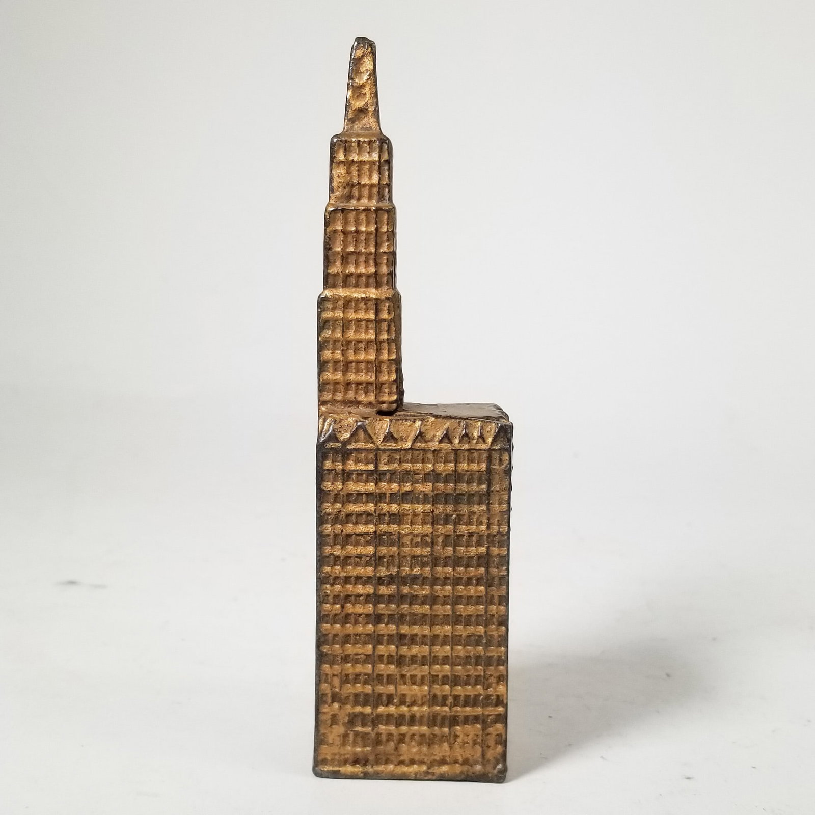 Cast Iron Woolworth Building Bank: Cast Iron Woolworth Building Bank Size 6" H Literature Brooks Auction – Online Auction Terms & Conditions Contact: (856) 694-2960 | info@brooks.auction READ BEFORE YOU BID: We want you to feel