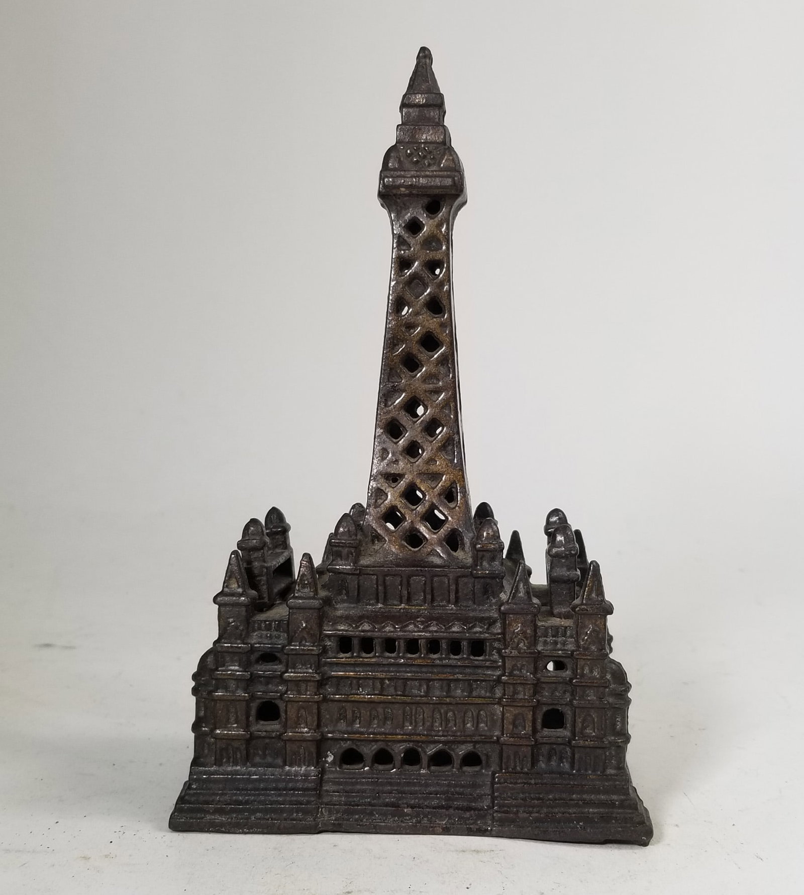 Blackpool Tower Cast Iron Bank: Blackpool Tower Cast Iron Bank Size 8" H Literature Brooks Auction – Online Auction Terms & Conditions Contact: (856) 694-2960 | info@brooks.auction READ BEFORE YOU BID: We want you to feel