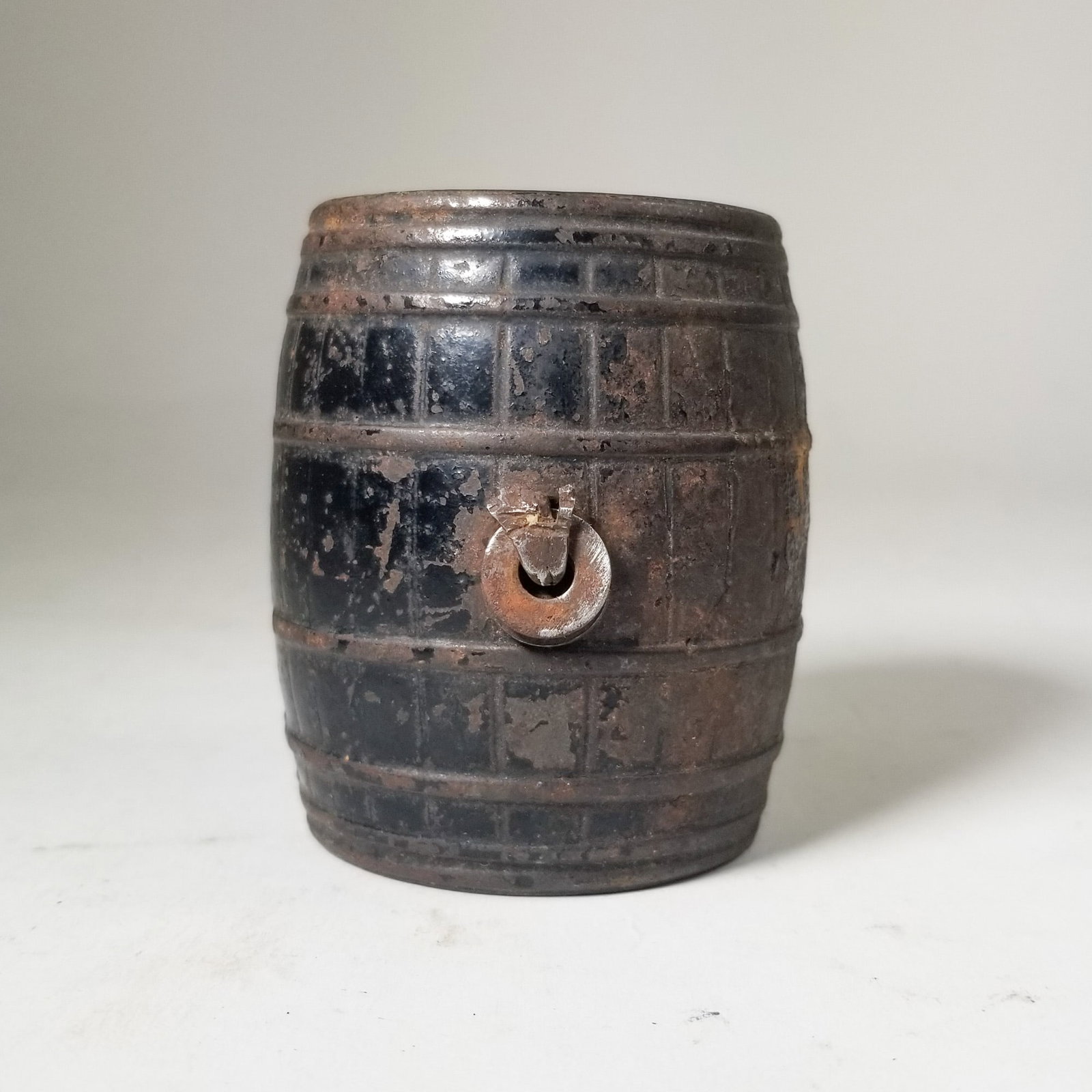 Cast Iron Barrel Still Bank: Cast Iron Barrel Still Bank Size 3" H Literature Brooks Auction – Online Auction Terms & Conditions Contact: (856) 694-2960 | info@brooks.auction READ BEFORE YOU BID: We want you to feel