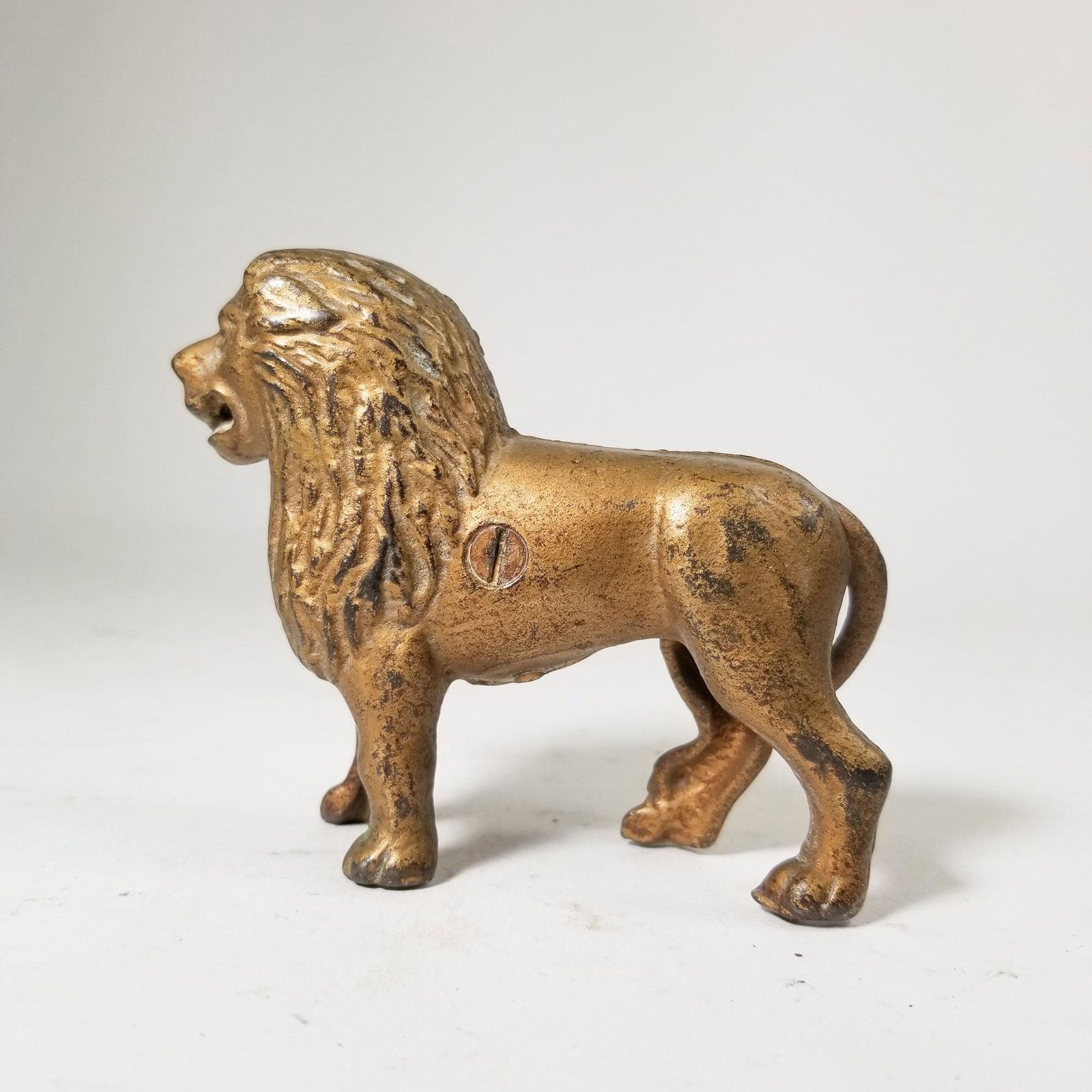 Cast Iron Lion Still Bank: Cast Iron Lion Still Bank Size 4" H Literature Brooks Auction – Online Auction Terms & Conditions Contact: (856) 694-2960 | info@brooks.auction READ BEFORE YOU BID: We want you to feel
