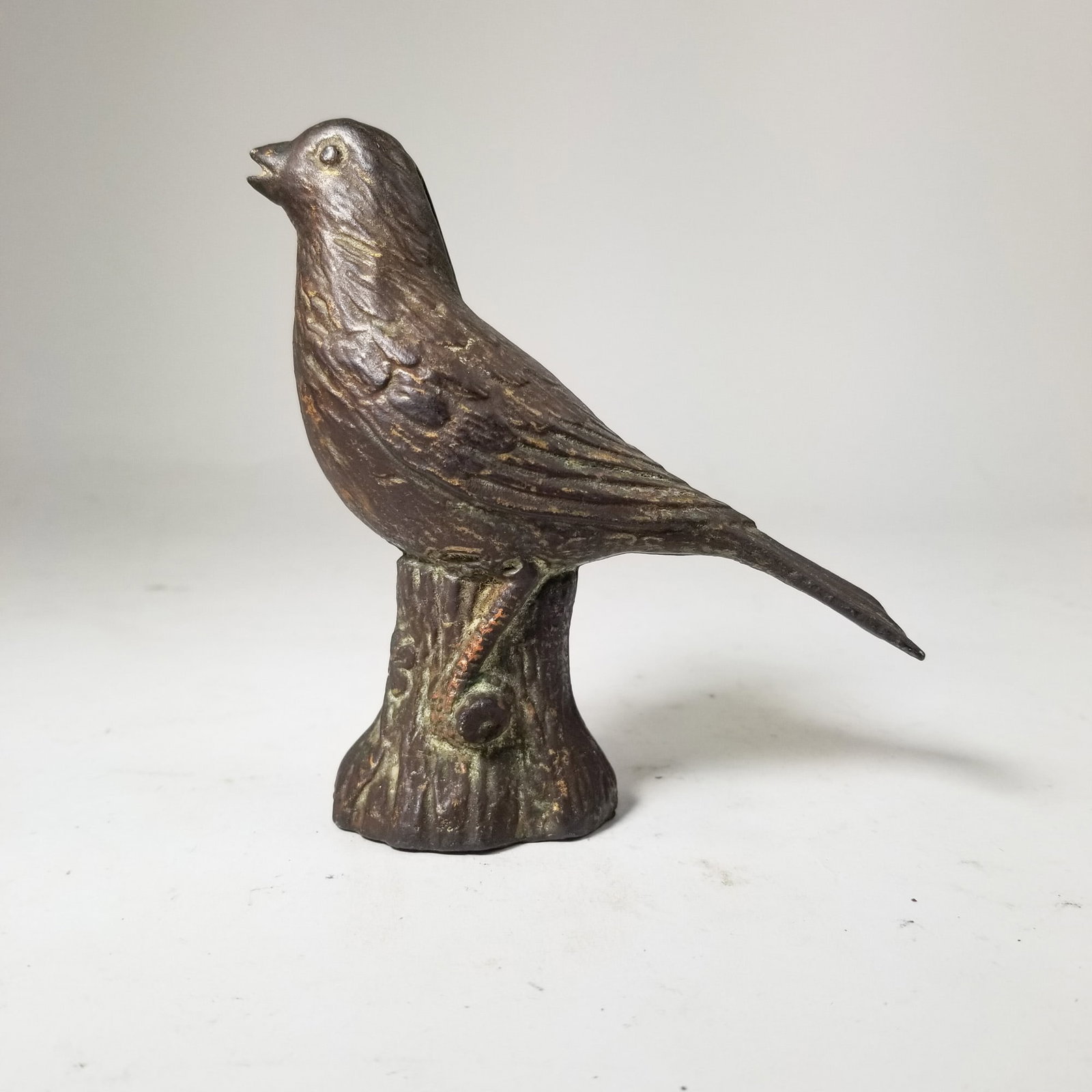 Cast Iron Songbird Still Bank: Cast Iron Songbird Still Bank Size 5" H Literature Brooks Auction – Online Auction Terms & Conditions Contact: (856) 694-2960 | info@brooks.auction READ BEFORE YOU BID: We want you to fe