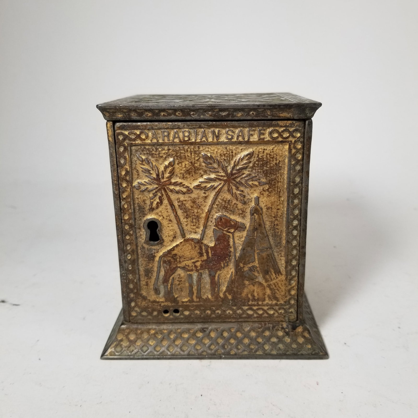 "Arabian Safe" Cast Iron Still Bank: "Arabian Safe" Cast Iron Still Bank, does not include key Size 5" H Literature Brooks Auction – Online Auction Terms & Conditions Contact: (856) 694-2960 | info@brooks.auction READ BEFORE YOU