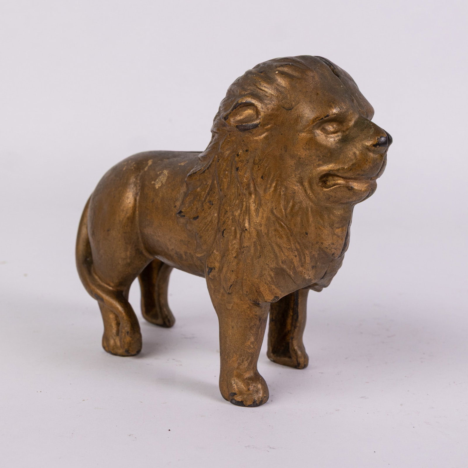 Cast Iron Lion Still Bank: Cast Iron Lion Still Bank Size 5" H Literature Brooks Auction – Online Auction Terms & Conditions Contact: (856) 694-2960 | info@brooks.auction READ BEFORE YOU BID: We want you to feel
