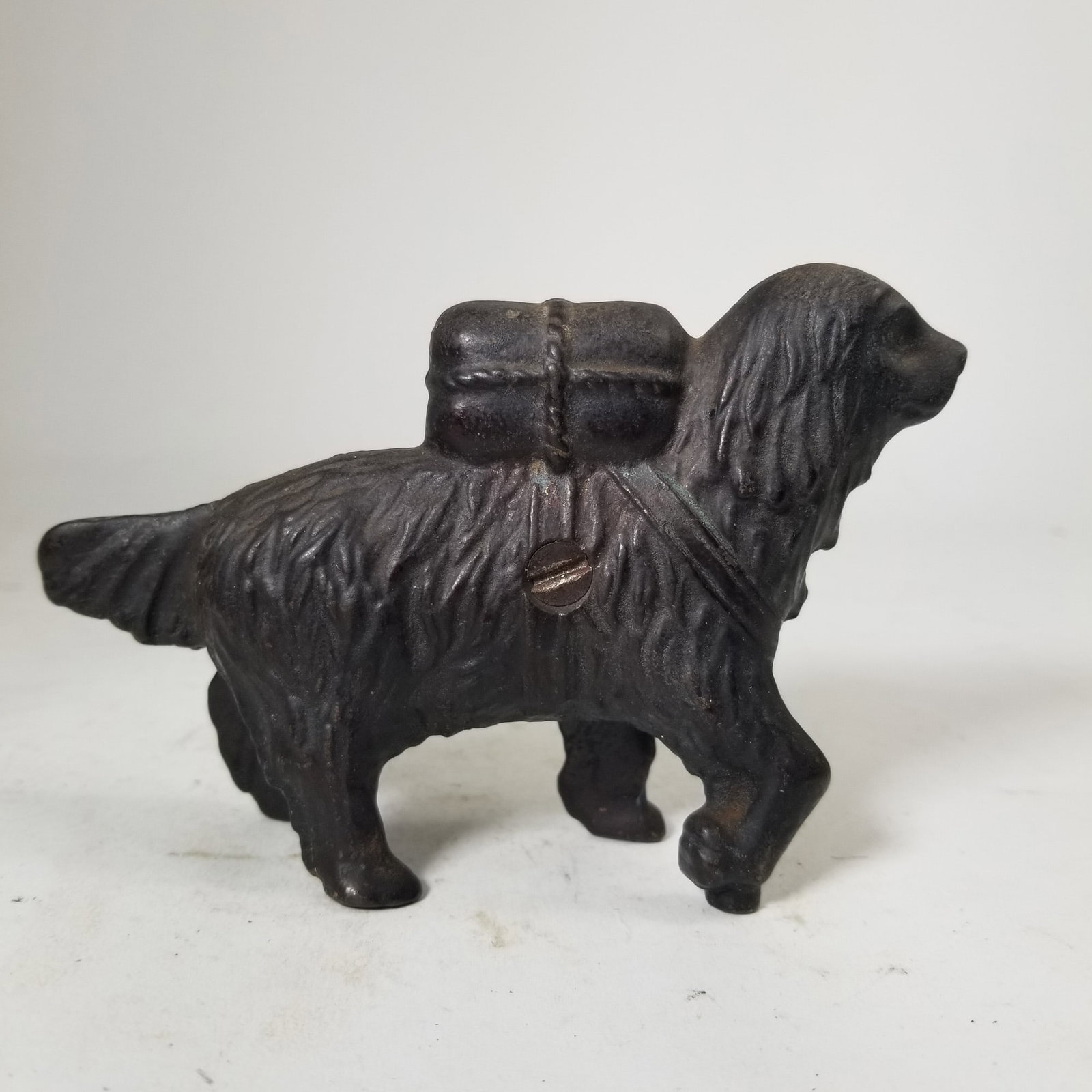St. Bernard Cast Iron Dog Still Bank: St. Bernard Cast Iron Dog Still Bank Size 4" H Literature Brooks Auction – Online Auction Terms & Conditions Contact: (856) 694-2960 | info@brooks.auction READ BEFORE YOU BID: We want you to