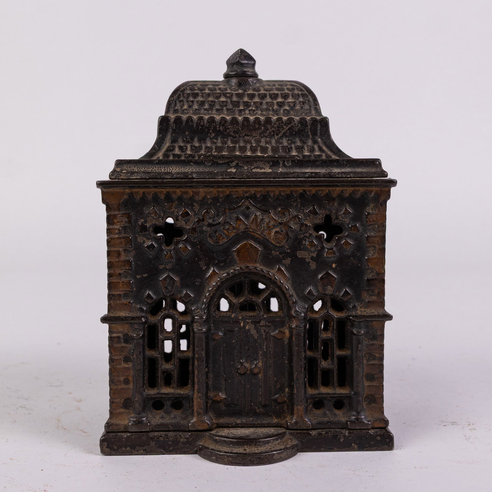 J. E. Stevens Cast Iron Roof Bank: J. E. Stevens Cast Iron Roof Bank Size 5" H Literature Brooks Auction – Online Auction Terms & Conditions Contact: (856) 694-2960 | info@brooks.auction READ BEFORE YOU BID: We want you to feel