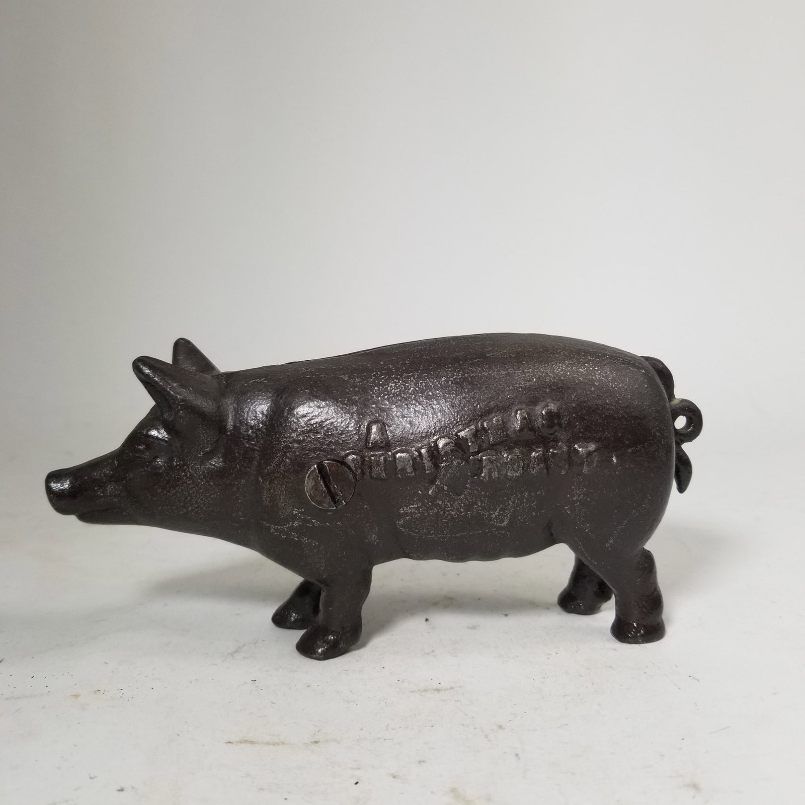 "A Christmas Roast" Cast Iron Pig Bank (1 of 4)