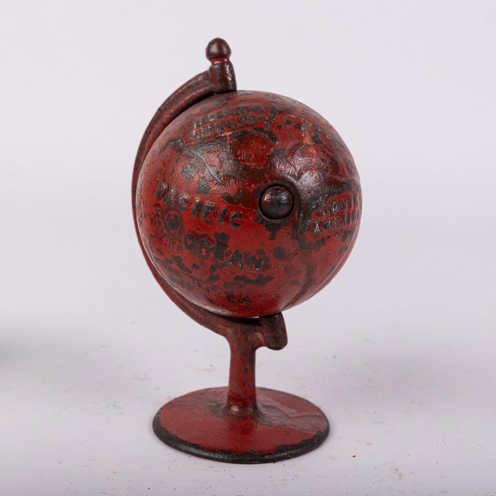 Globe on Arc Grey Iron Cast Iron Bank: Globe on Arc Grey Iron Cast Iron Bank Size 5.5" H Literature Brooks Auction – Online Auction Terms & Conditions Contact: (856) 694-2960 | info@brooks.auction READ BEFORE YOU BID: We want you to