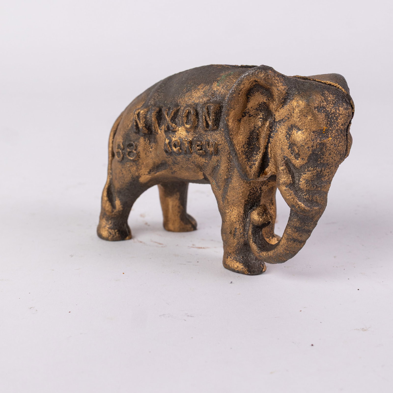 Nixon/Agnew 1968 Elephant Cast Iron Still Bank: Nixon/Agnew 1968 Elephant Cast Iron Still Bank Size 3" H Literature Brooks Auction – Online Auction Terms & Conditions Contact: (856) 694-2960 | info@brooks.auction READ BEFORE YOU BID: We want