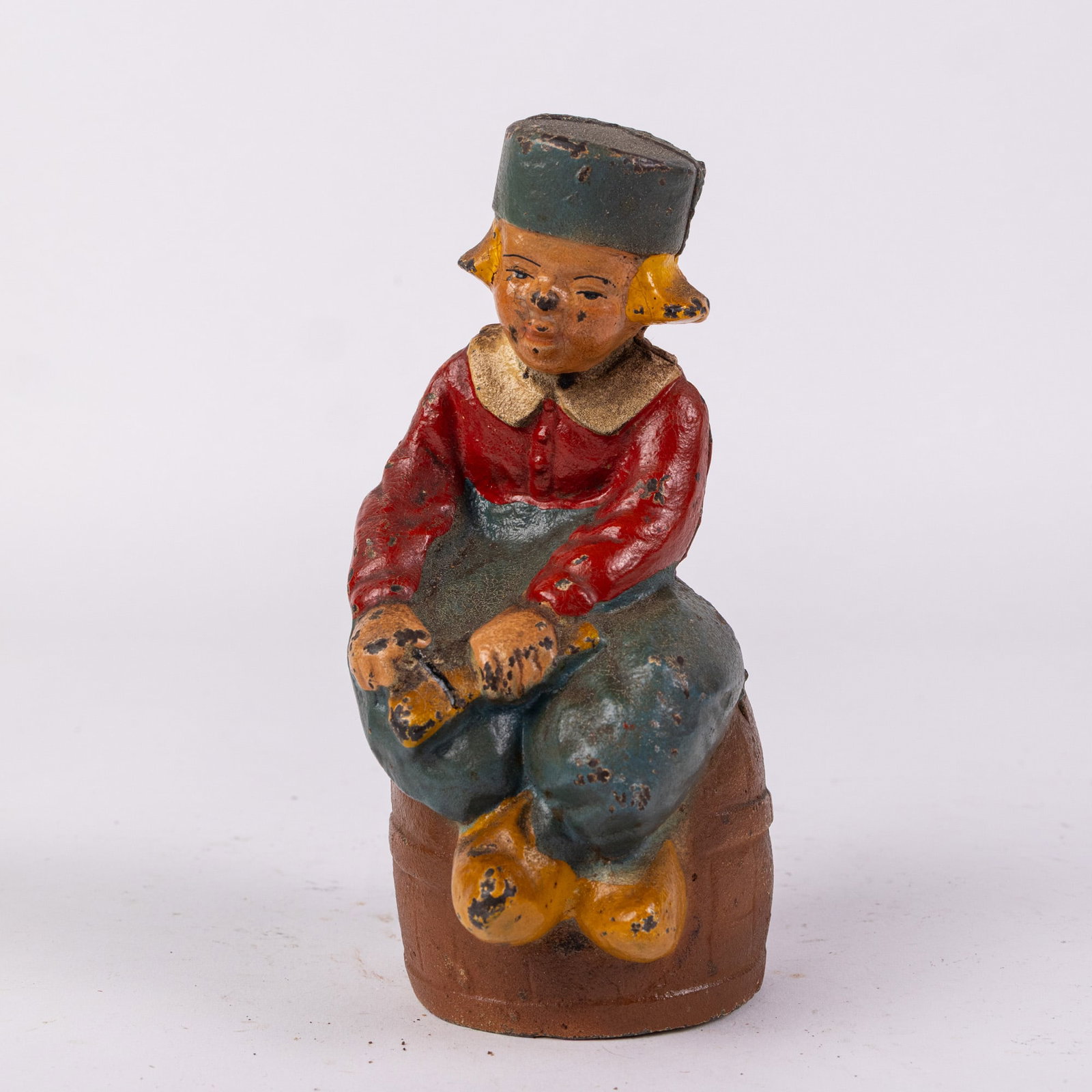 Dutch Boy on Barrel Cast Iron Still Bank: Dutch Boy on Barrel Cast Iron Still Bank Size 6" H Literature Brooks Auction – Online Auction Terms & Conditions Contact: (856) 694-2960 | info@brooks.auction READ BEFORE YOU BID: We wan