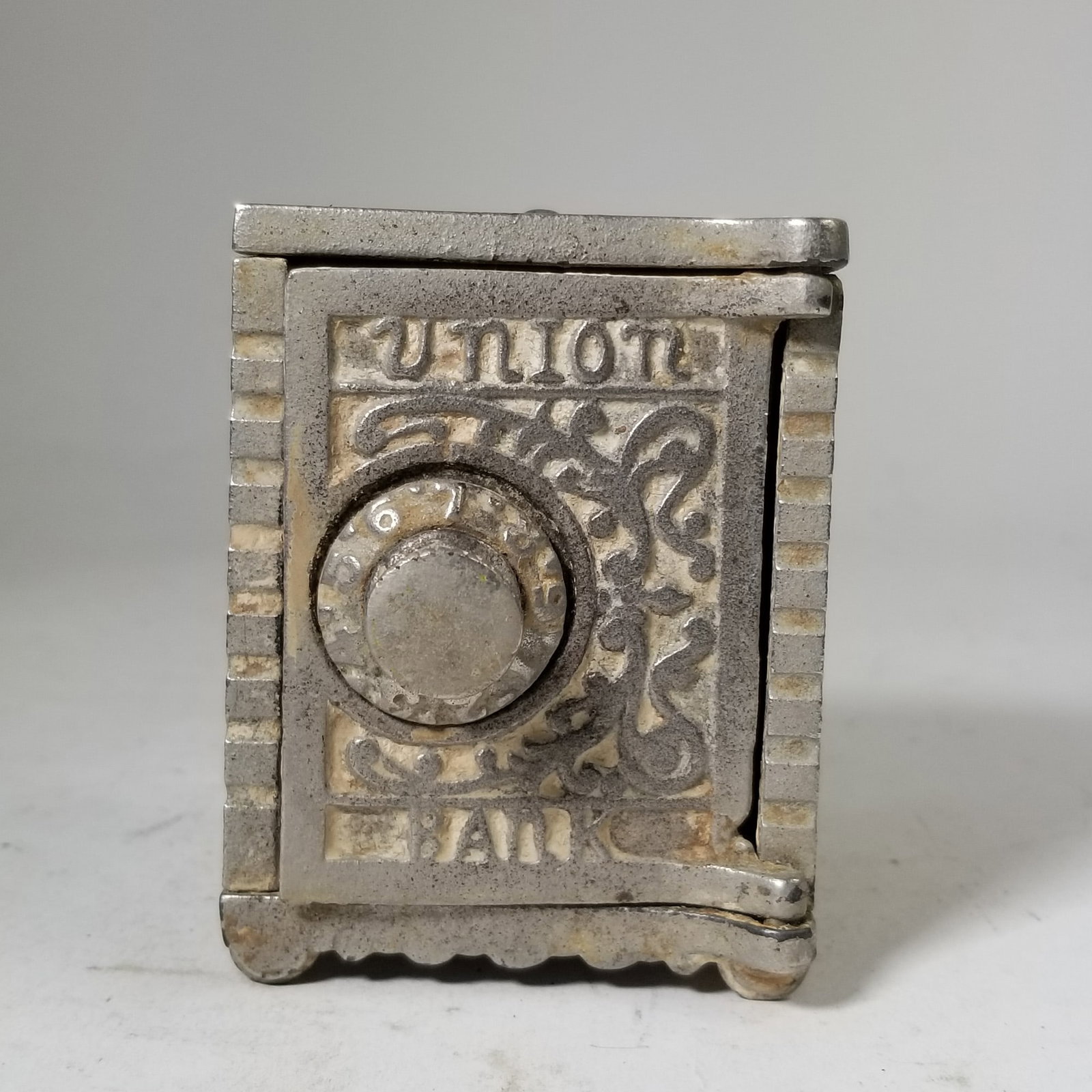 Union Bank Cast Iron Still Bank: Union Bank Cast Iron Still Bank Size 3" H Literature Brooks Auction – Online Auction Terms & Conditions Contact: (856) 694-2960 | info@brooks.auction READ BEFORE YOU BID: We want you to