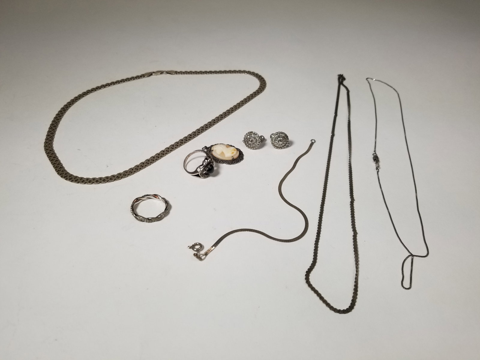 Assorted Vintage Sterling Silver Jewelry: Assorted Vintage Sterling Silver Jewelry, marked 925 weight 40g ring Size 7 Literature Brooks Auction – Online Auction Terms & Conditions