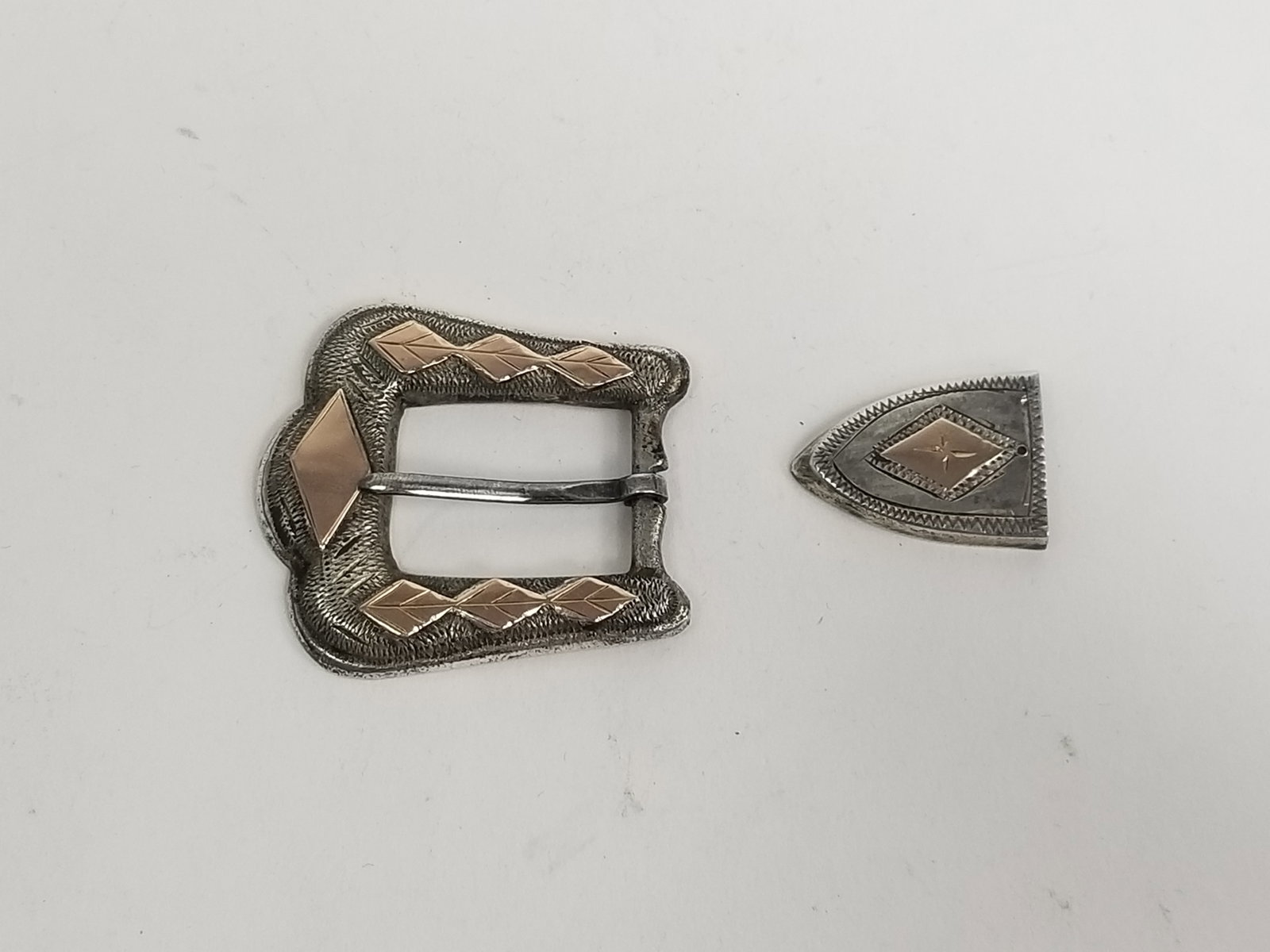 Sterling Silver Belt Buckle and Tip Set: Sterling Silver Belt Buckle and Tip Set, marked 925, total weight 32.4g Literature Brooks Auction – Online Auction Terms & Conditions