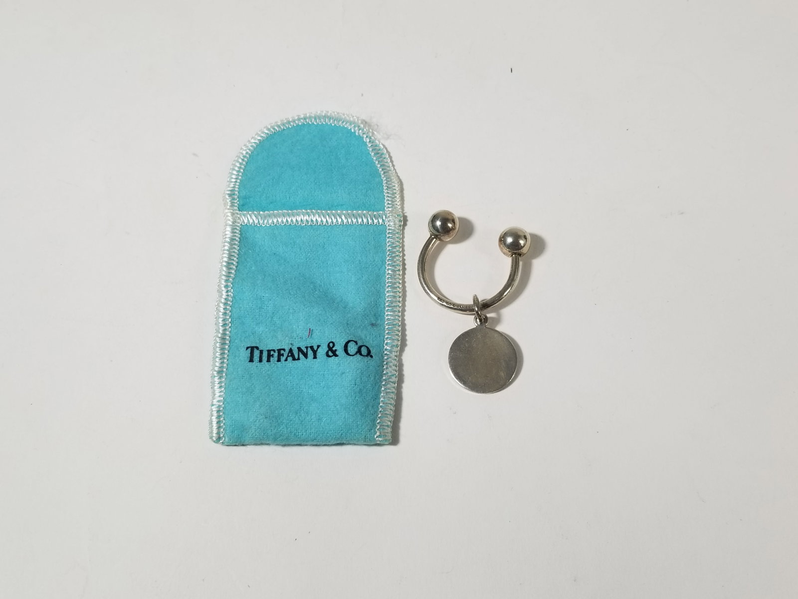 VIntage Tiffany & Co. Key Ring In Original Bag: VIntage Tiffany & Co. Key Ring In Original Bag total weight 10.2g Literature Brooks Auction – Online Auction Terms & Conditions