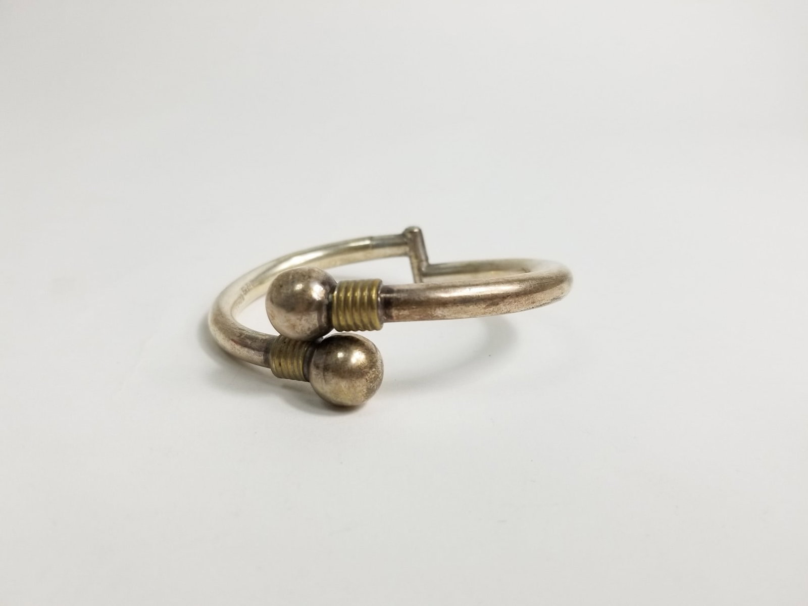 Mexican Hinge Two Tone Sterling Silver Bracelet: Mexican Hinge Two Tone Sterling Silver Bracelet, marked 925, weight 29g Literature Brooks Auction – Online Auction Terms & Conditions