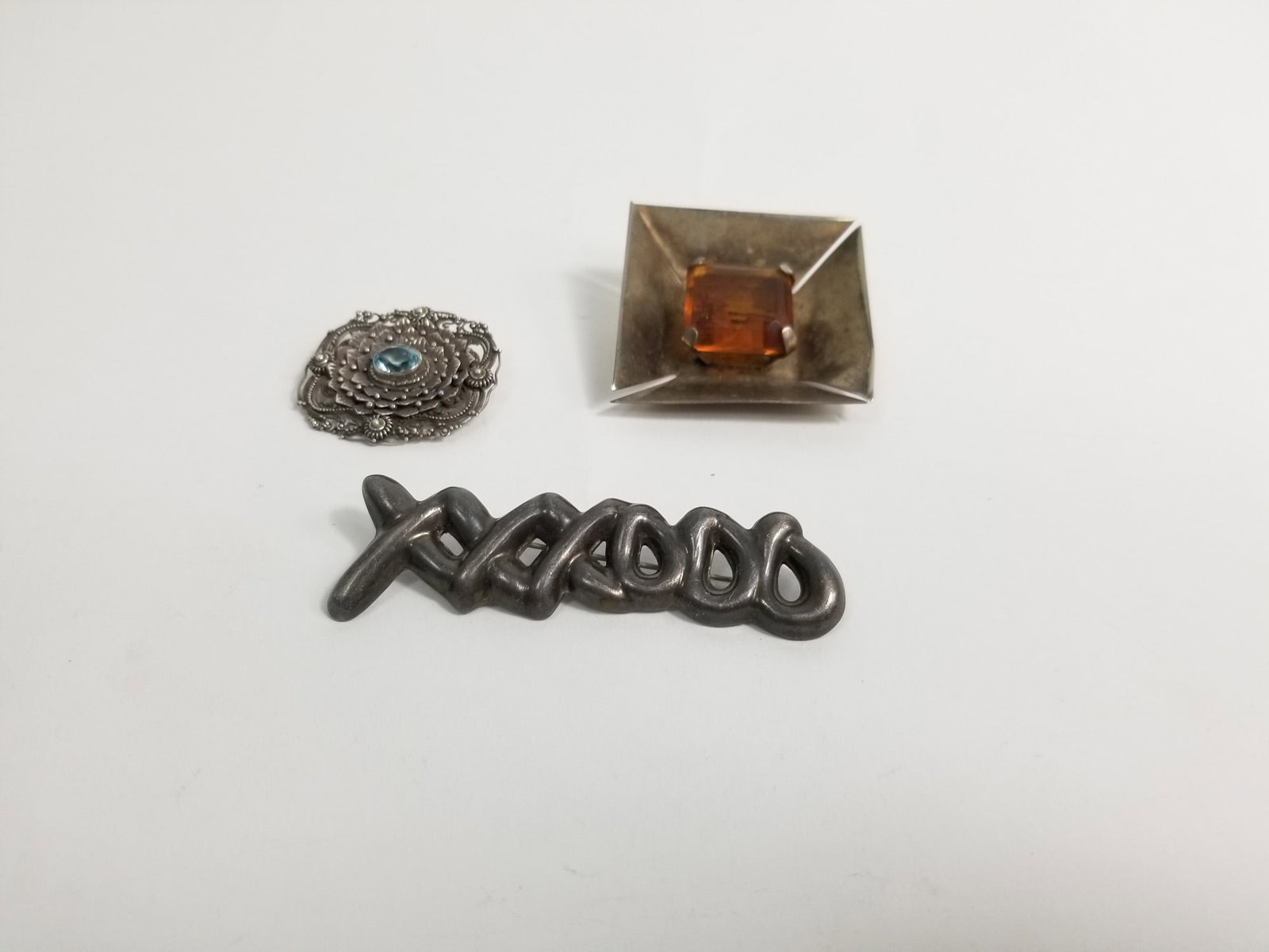 Three Sterling Silver Statement Brooches: Three Sterling Silver Statement Brooches, marked 925, Total Weight 43g Literature Brooks Auction – Online Auction Terms & Conditions