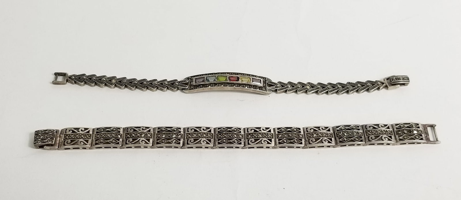 Pair of Detailed Sterling Silver Bracelets: Pair of Detailed Sterling Silver Bracelets marked 925, weight 48.3g Literature Brooks Auction – Online Auction Terms & Conditions —————————&