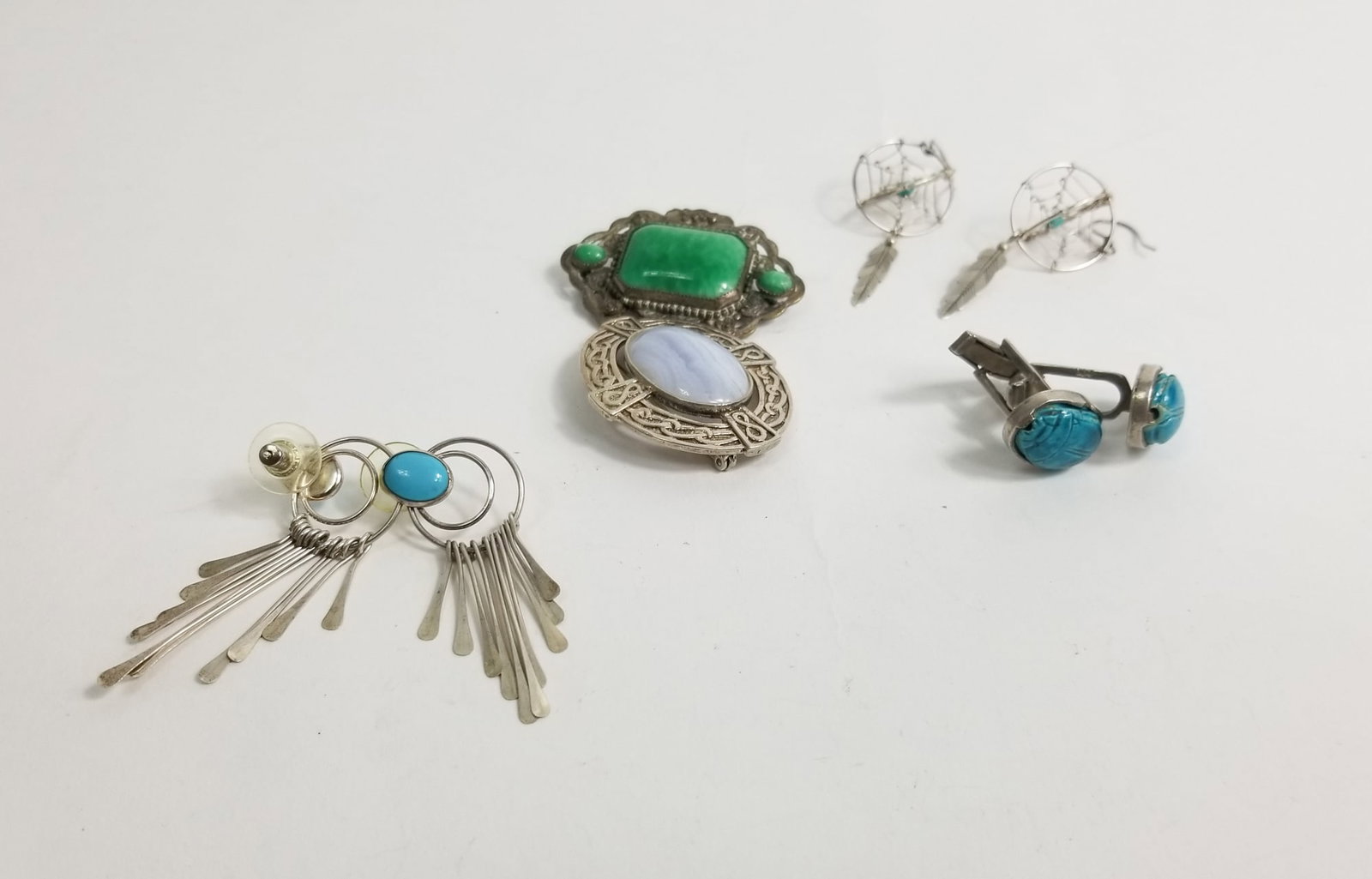 Assorted Sterling Silver Jewelry: Assorted Sterling Silver Jewelry including: cufflinks - pairs of earrings - Brooches, Marked 925, total weight 49.2 Literature Brooks Auction – Online Auction Terms & Conditions ——&#