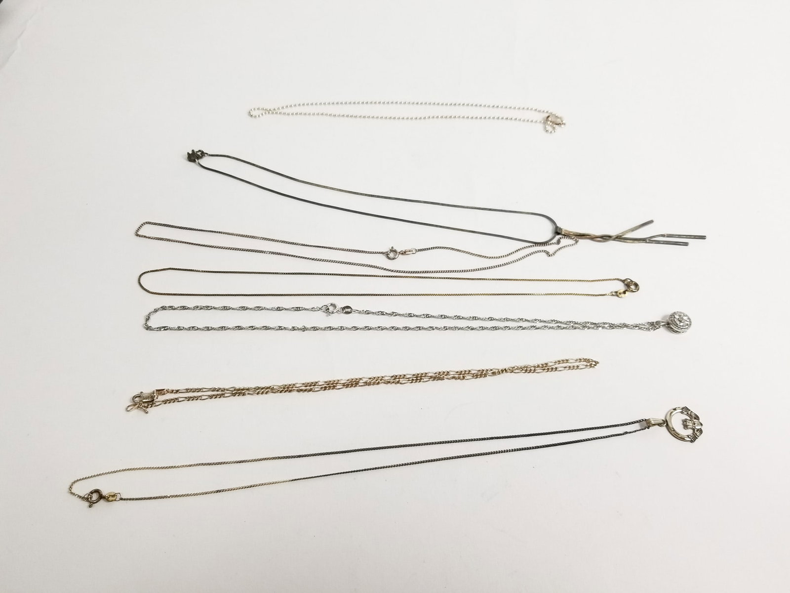 Seven Classic Sterling Silver Necklaces: (7)Classic Sterling Silver Necklaces Marked 925, Weight 26.8g Literature Brooks Auction – Online Auction Terms & Conditions