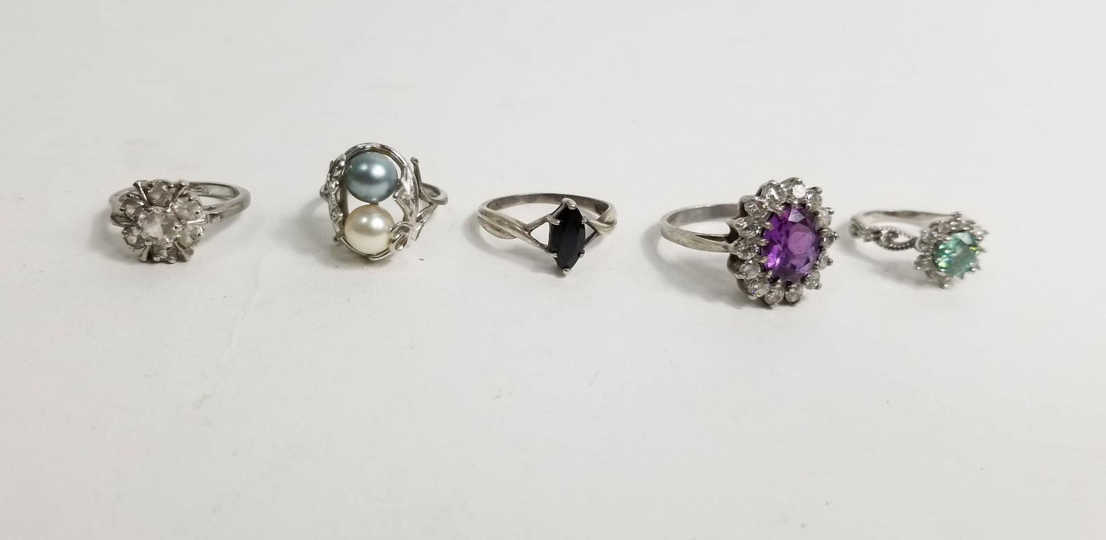 Five Statement Sterling Silver Rings: Five Statement Sterling Silver Rings, Marked 925 Total weight 18.4 Sizes (2) Size 8 - (2) Size 5.5 - (1) Size 4.5 Literature Brooks Auction – Online Auction Terms & Conditions
