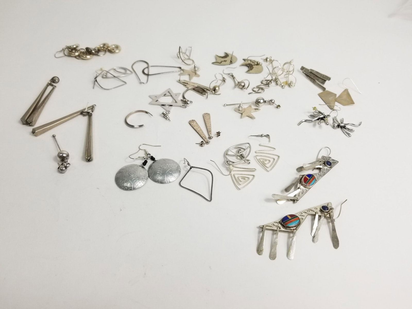 Pairs of Unmarked earrings: Pairs of Unmarked earrings Vintage and contemporary earrings Literature Brooks Auction – Online Auction Terms & Conditions