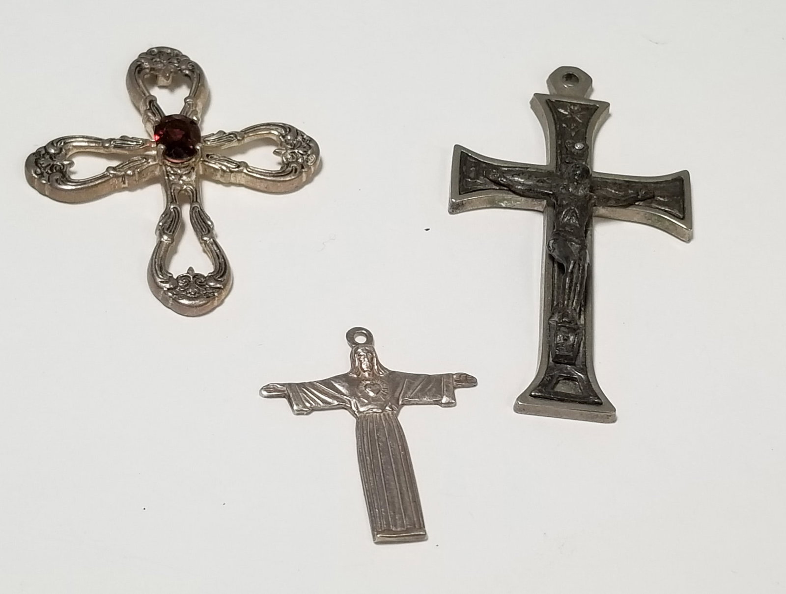 Three Sterling Silver Cross Pendants: (3) Sterling Silver Cross Pendants, Marked 925, weight 21.6g Literature Brooks Auction – Online Auction Terms & Conditions