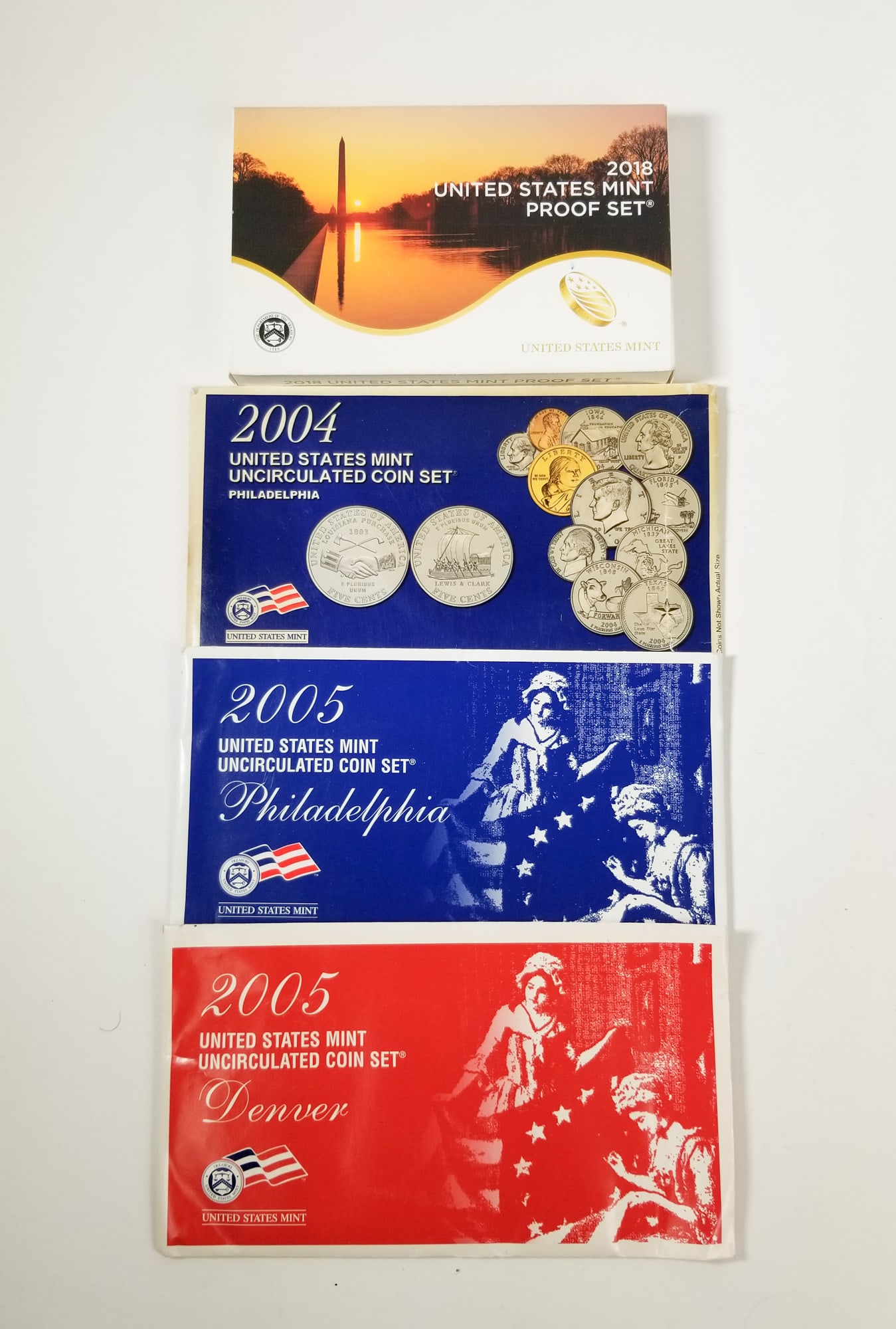 2005 Uncirculated coin Set Denver/ Philadelphia 2004 uncircculated coin Set 2018 US Mint Proof Set: 2005 Uncirculated coin Set Denver and Philadelphia, 2004 uncircculated coin Set, 2018 US Mint Proof Set Literature Brooks Auction – Online Auction Terms & Conditions