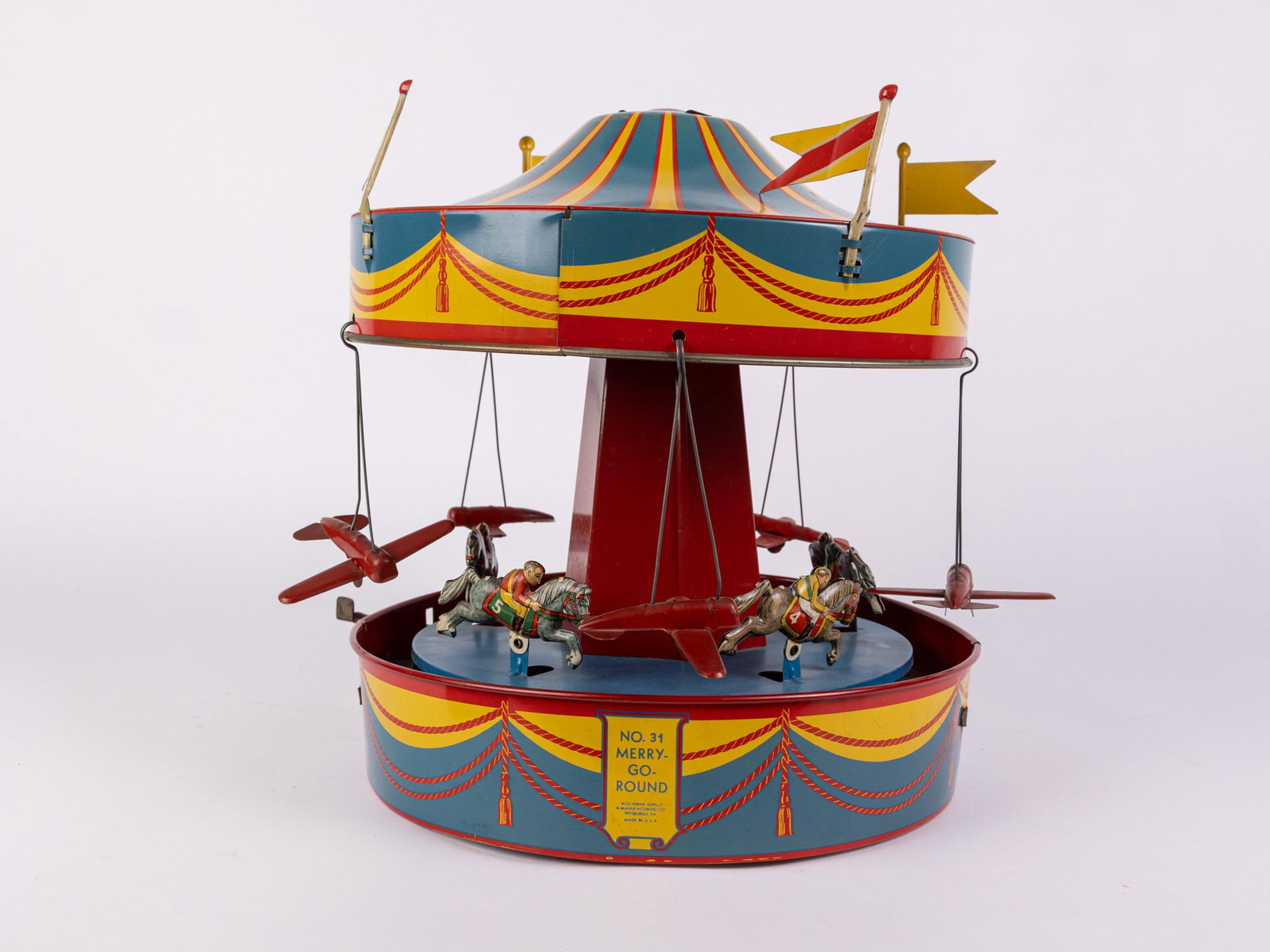 Wolverine Supply No. 31 Merry Go Round Child's Tin Toy (1 of 7)